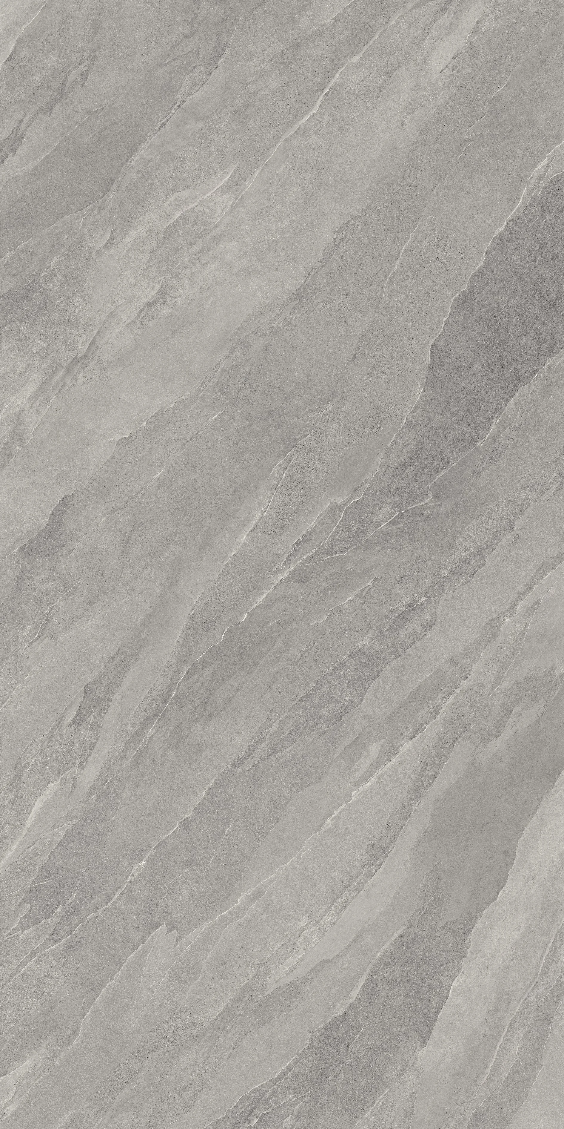 Close-up of a gray stone or tile surface with natural veining and texture.