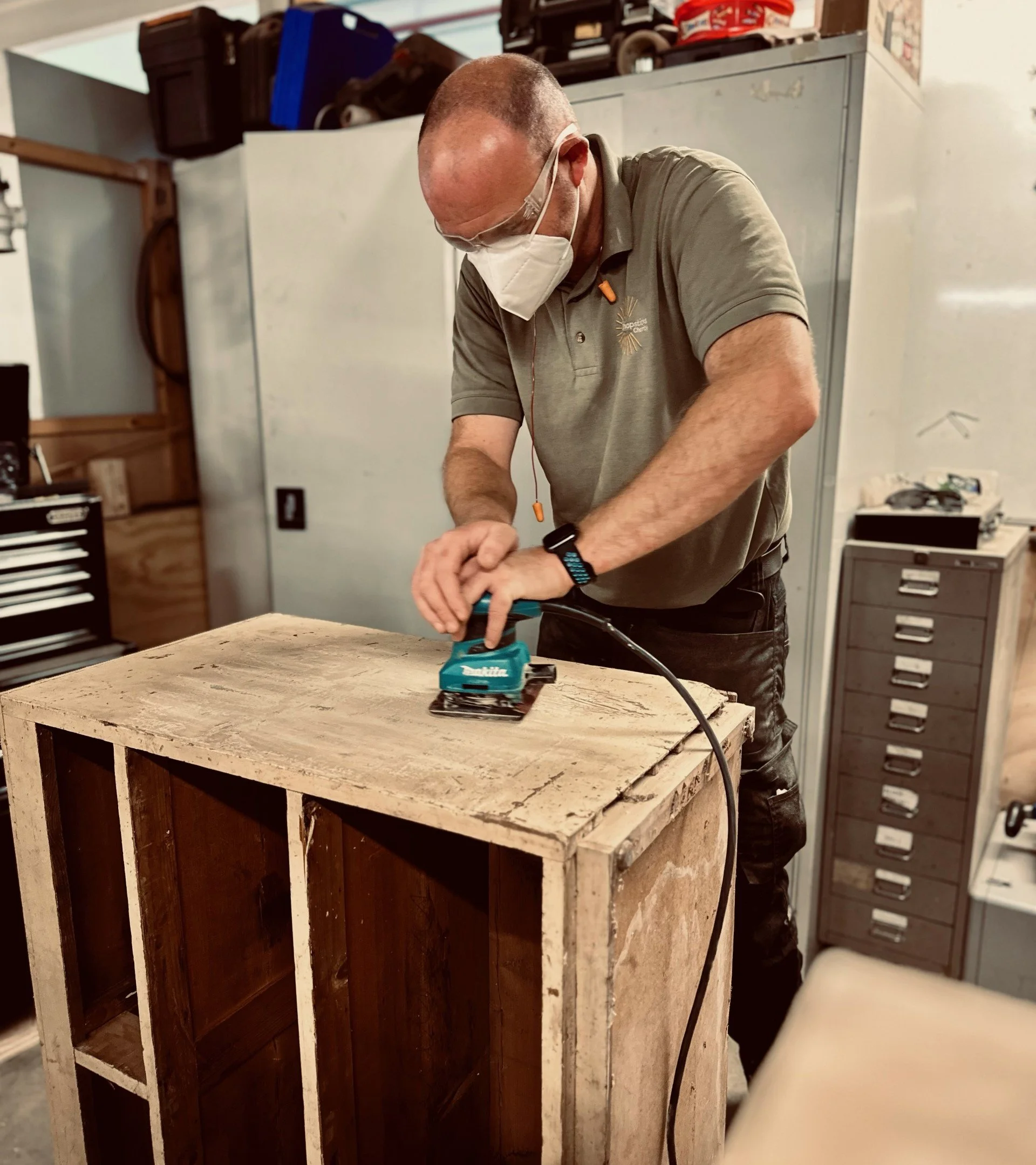 Lou sanding furniture.jpg