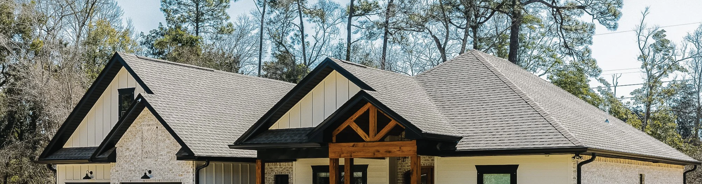 A shot of a residential roof we installed, representing the roofing services we offer throughout Pensacola, Pace, Milton, and the surrounding areas.