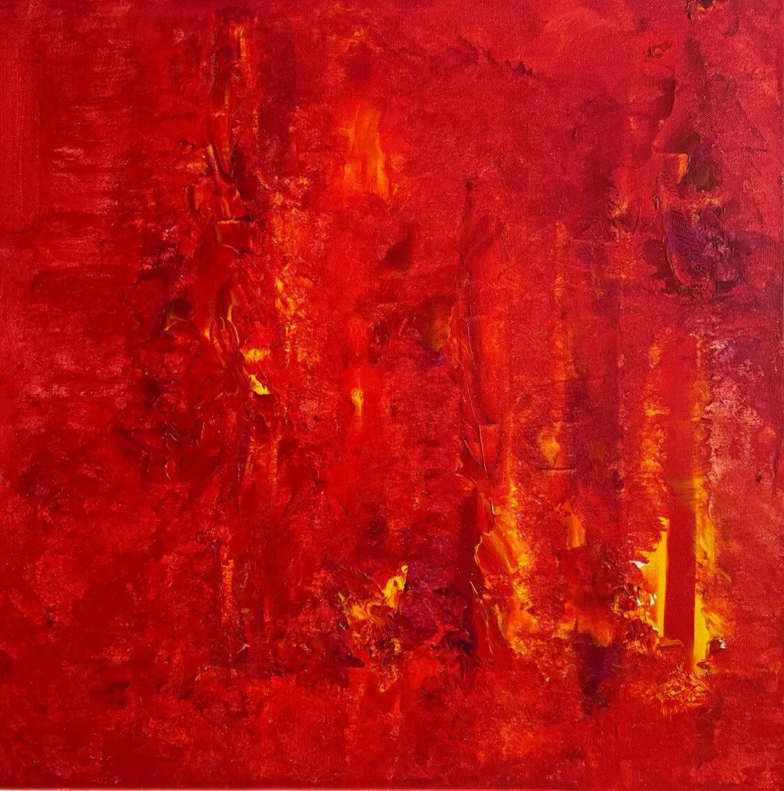 Contemporary abstract painting in layered tones of red, magenta, and yellow representing a forest fire with both prominent and subtle emerging faces of animals and people.