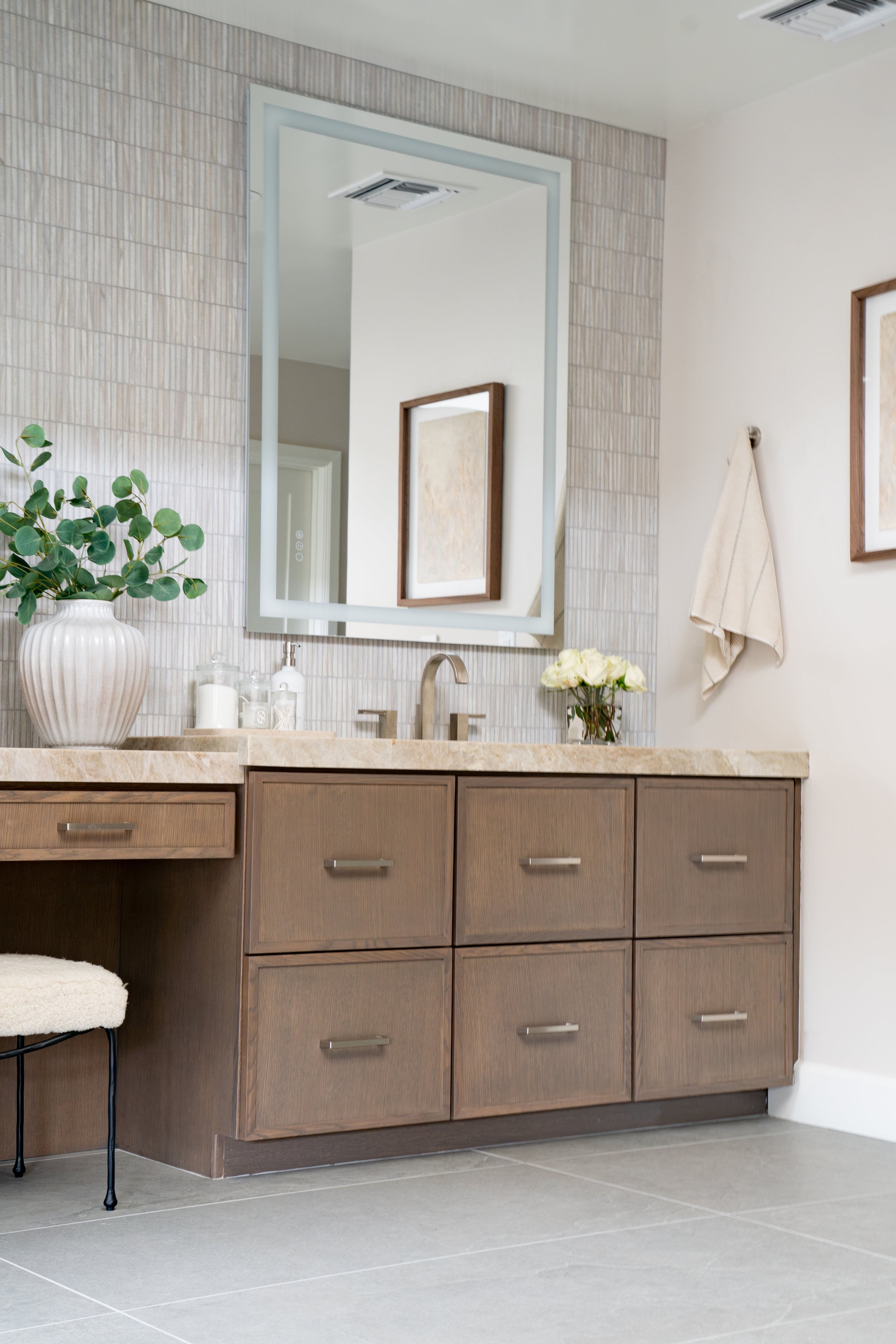 Modern bathroom vanity with brown wood cabinets_Scottsdale luxury home interior by Red Egg Design Group