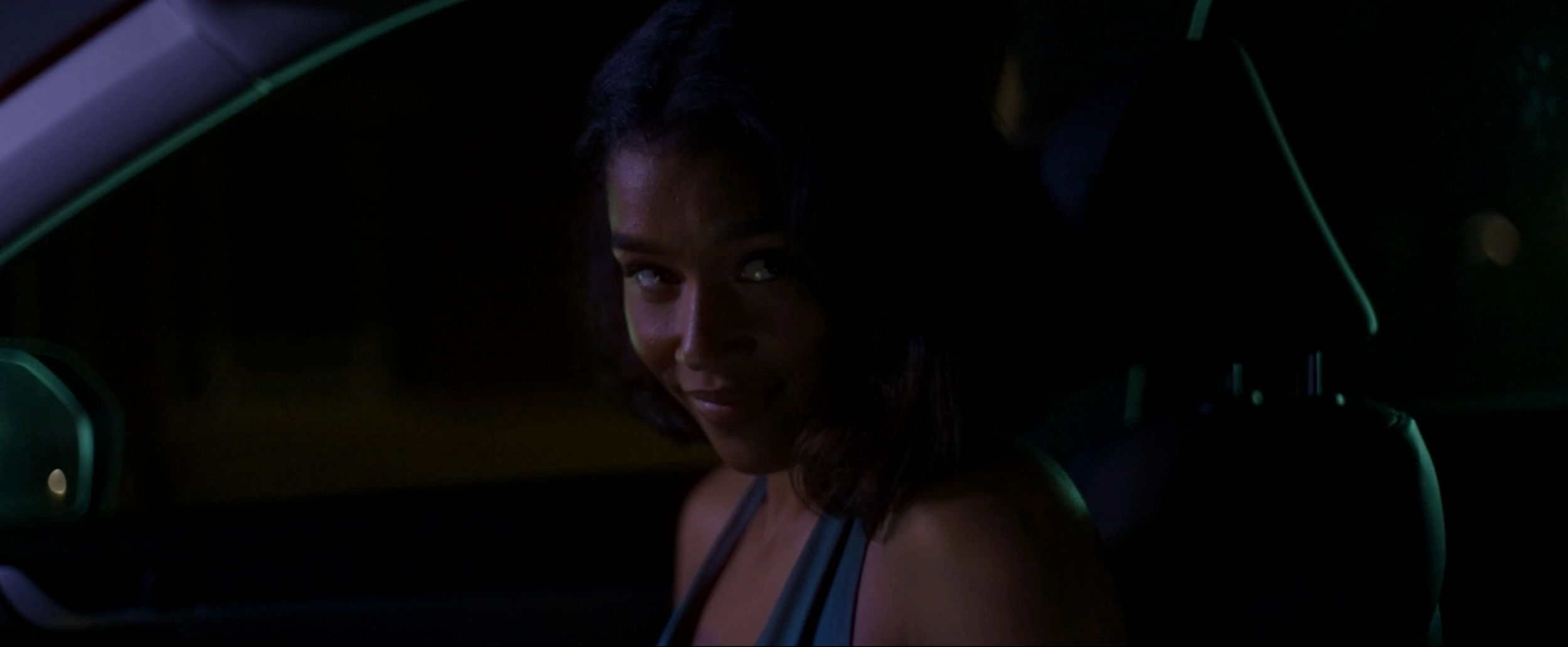 Savannah Bangoura in a nighttime car scene.