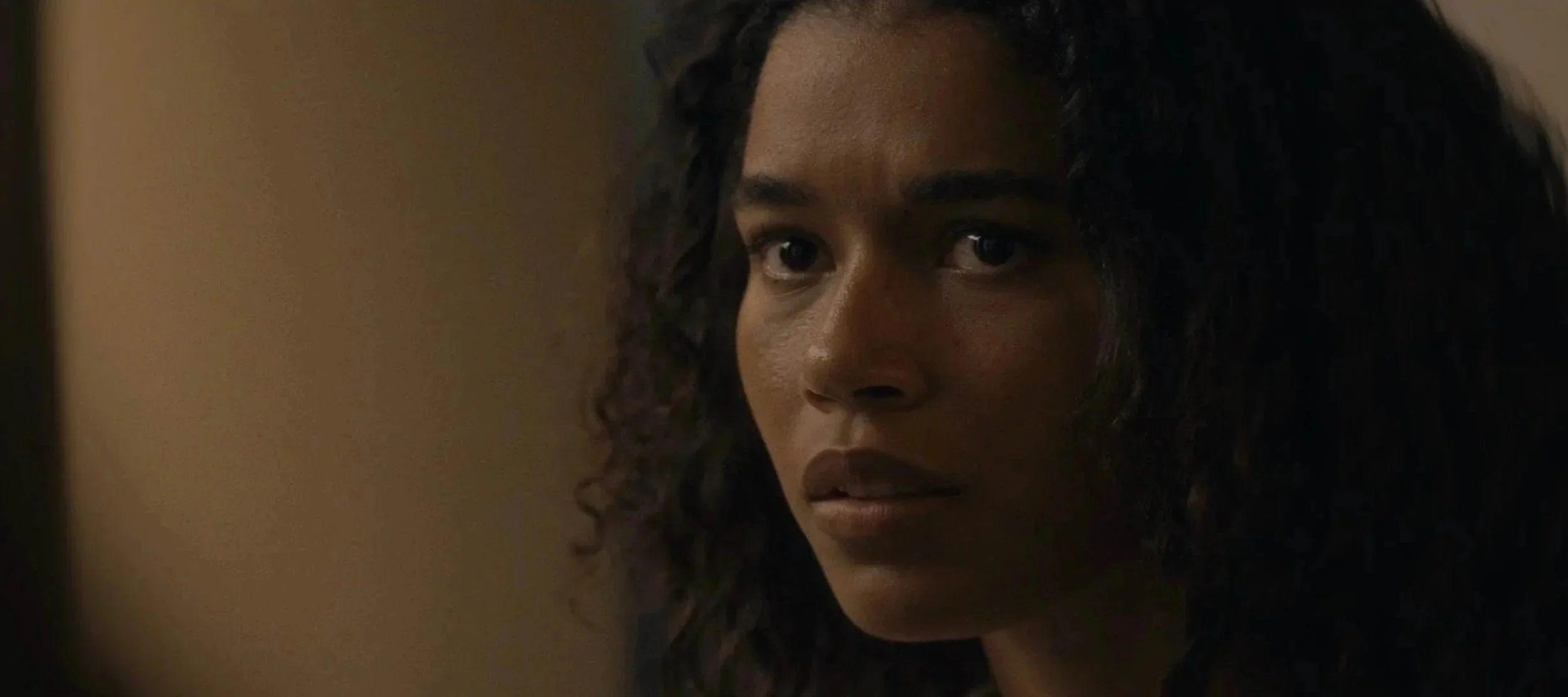 Savannah Bangoura in a dramatic close-up film still.