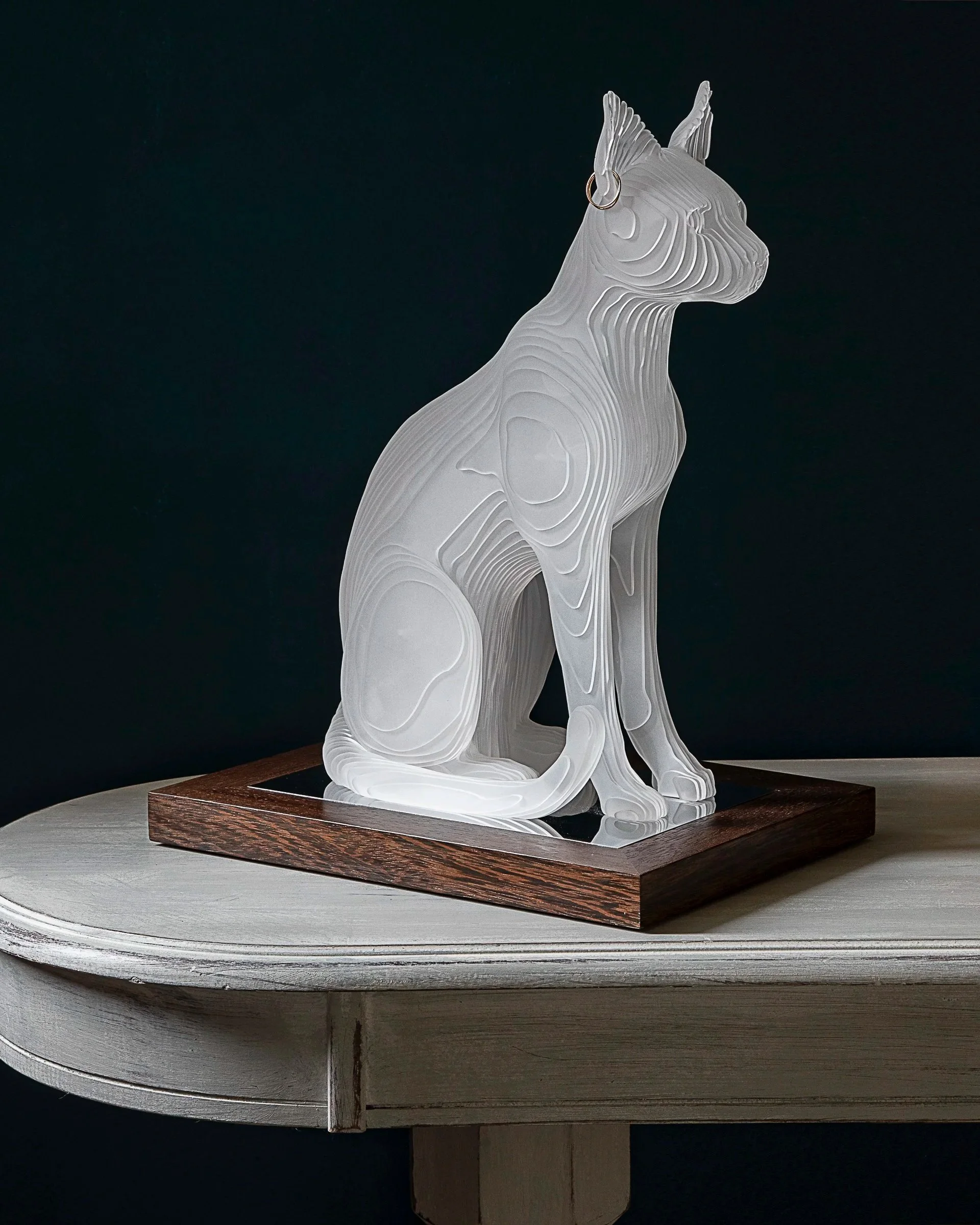 BASTET+2019.+24cm+x+34cm+x+44cm.+Acrylic+on+polished+steel+on+sapele+base.+Edition+of+12.+%C2%A31950.+Photo+Deborah+Husk+2.jpg