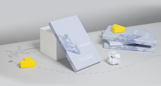A minimalistic study setup with books titled 'Focus' and 'How to Focus' featuring a horse illustration, a crumpled paper, yellow arrow-shaped objects, and scattered paper and markings on a light gray surface.