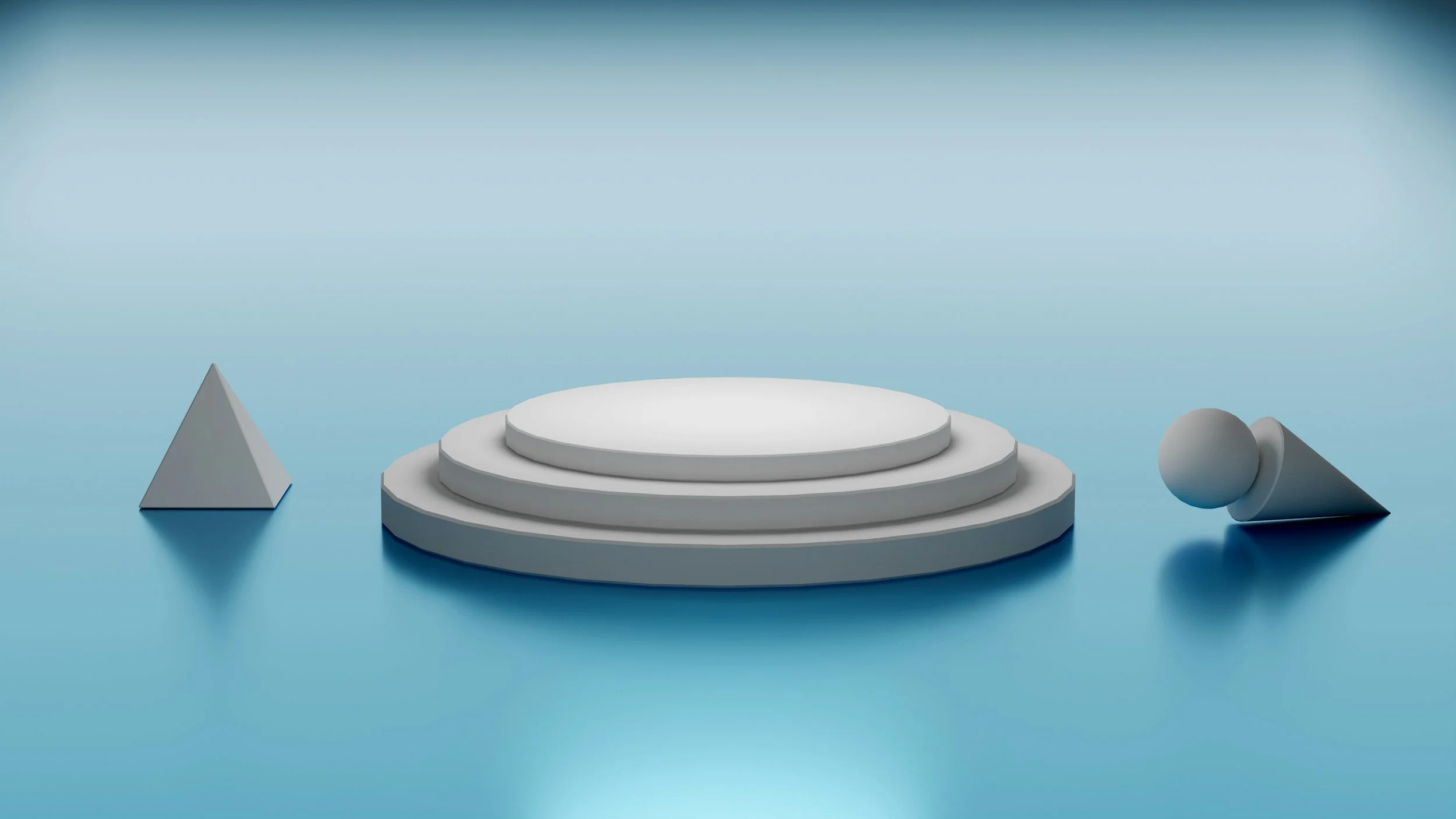 Minimalist arrangement of three geometric shapes on a blue surface with a light blue background, including a triangle on the left, a set of three concentric circular platforms in the center, and a cone with a sphere on top on the right.