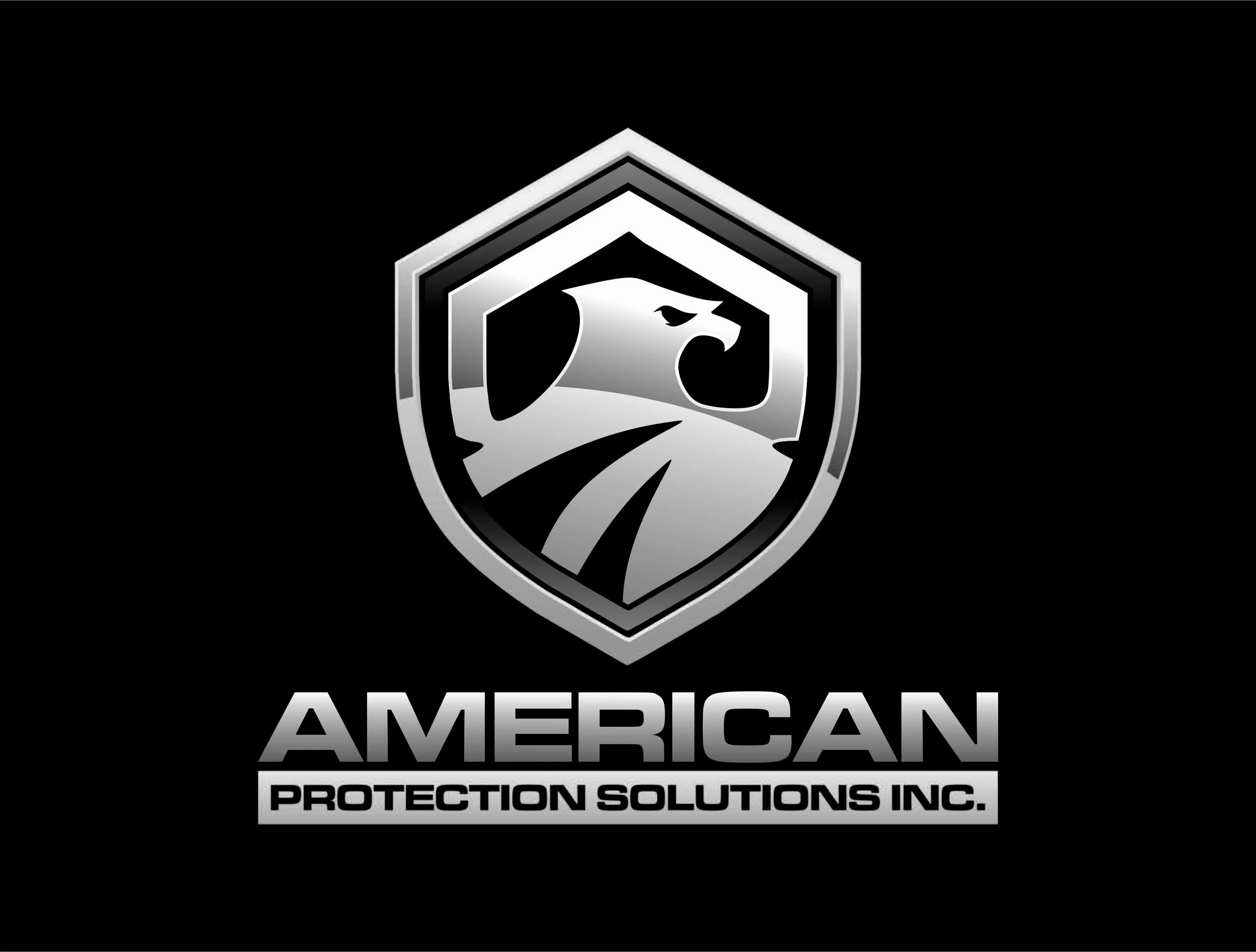 A silver and black shield emblem featuring a stylized eagle head, with the words "AMERICAN PROTECTION SOLUTIONS INC." beneath it.

American protection solutions 

security 

guard