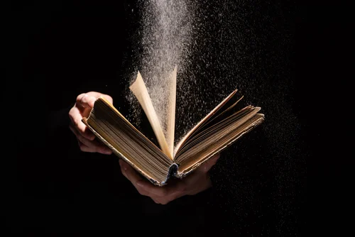 Bible opened with light shining on it
