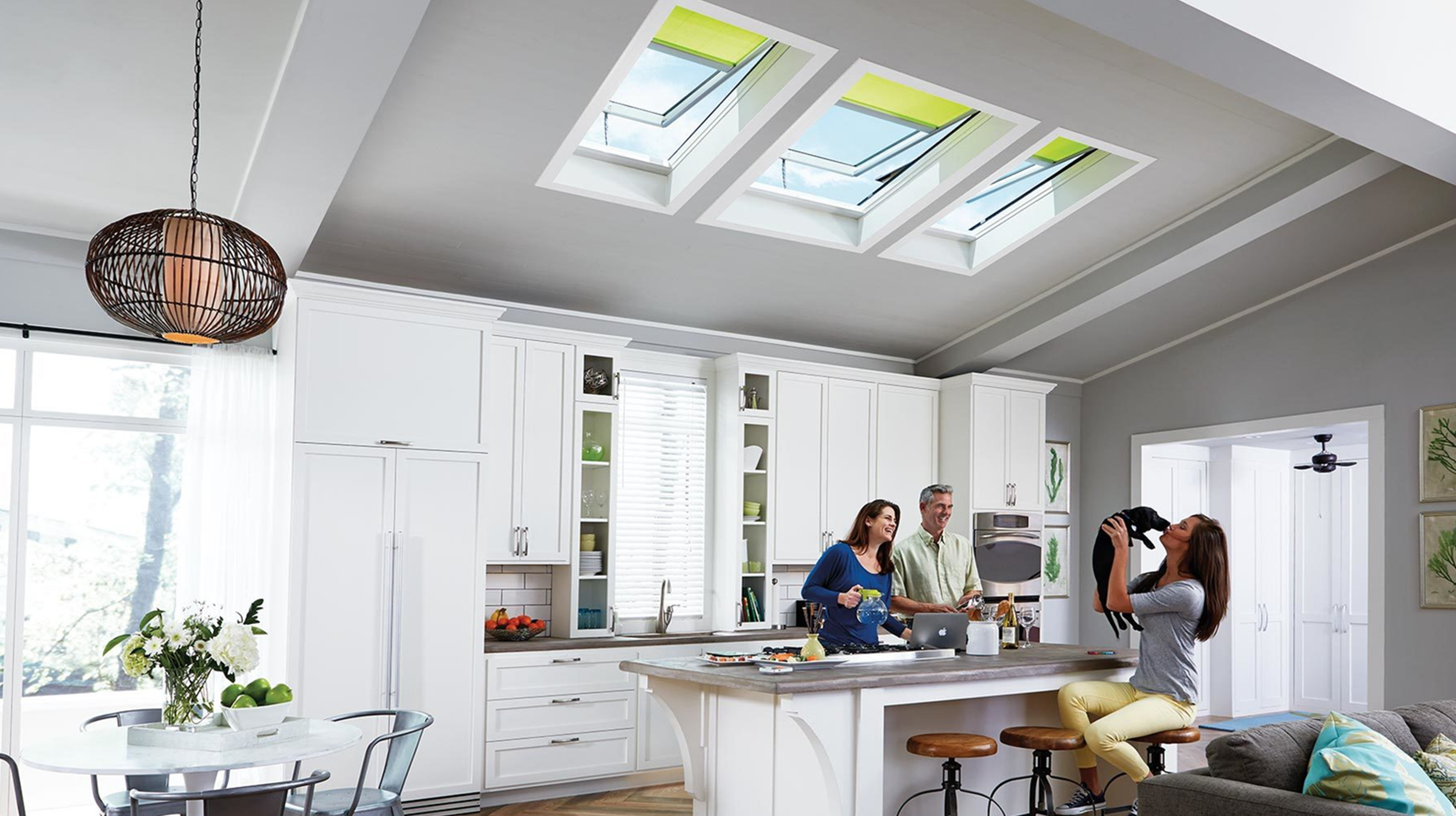 Kitchen with ventilated skylights and shades.