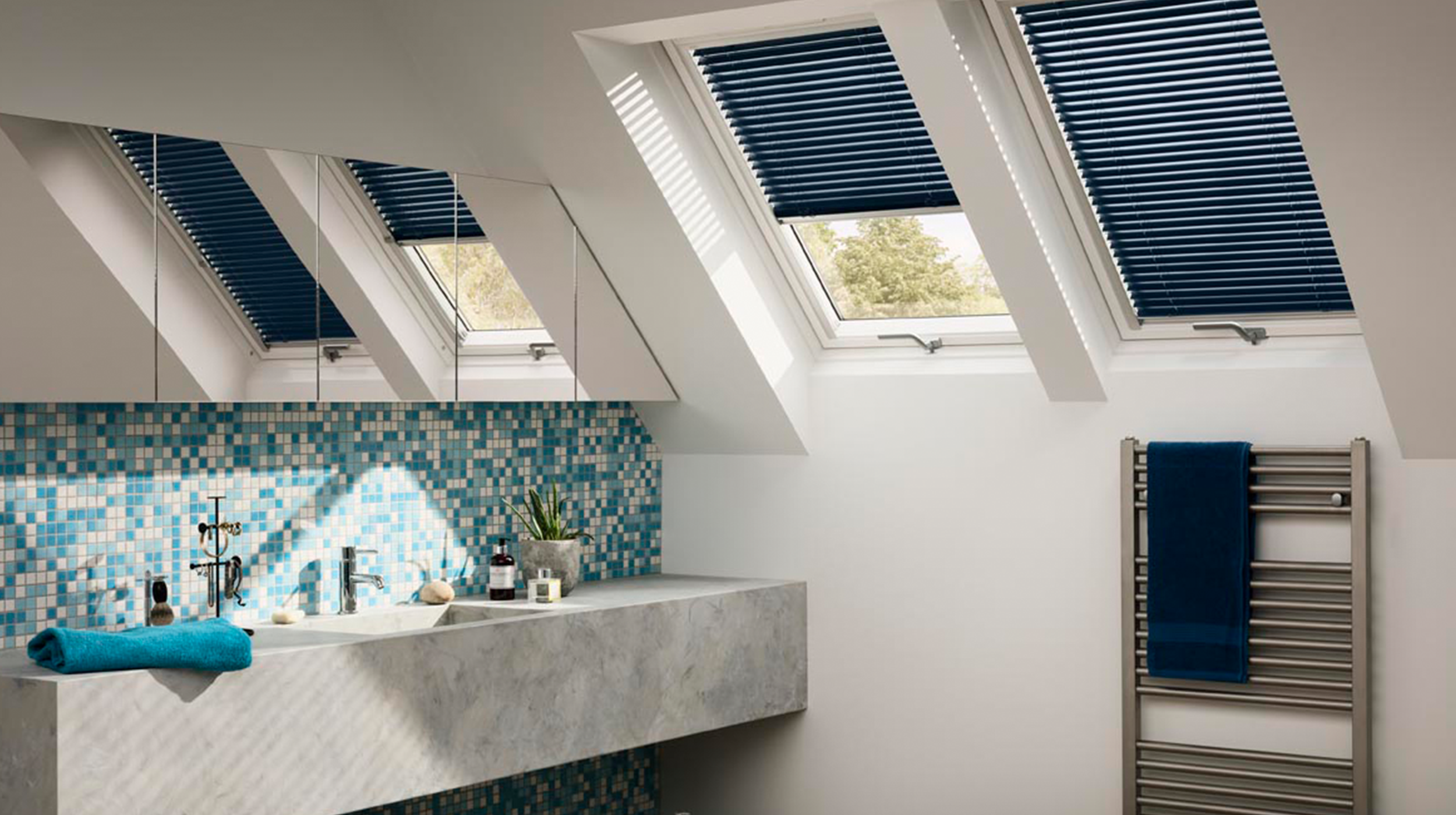 Bathroom with ventilated skylights and shades.