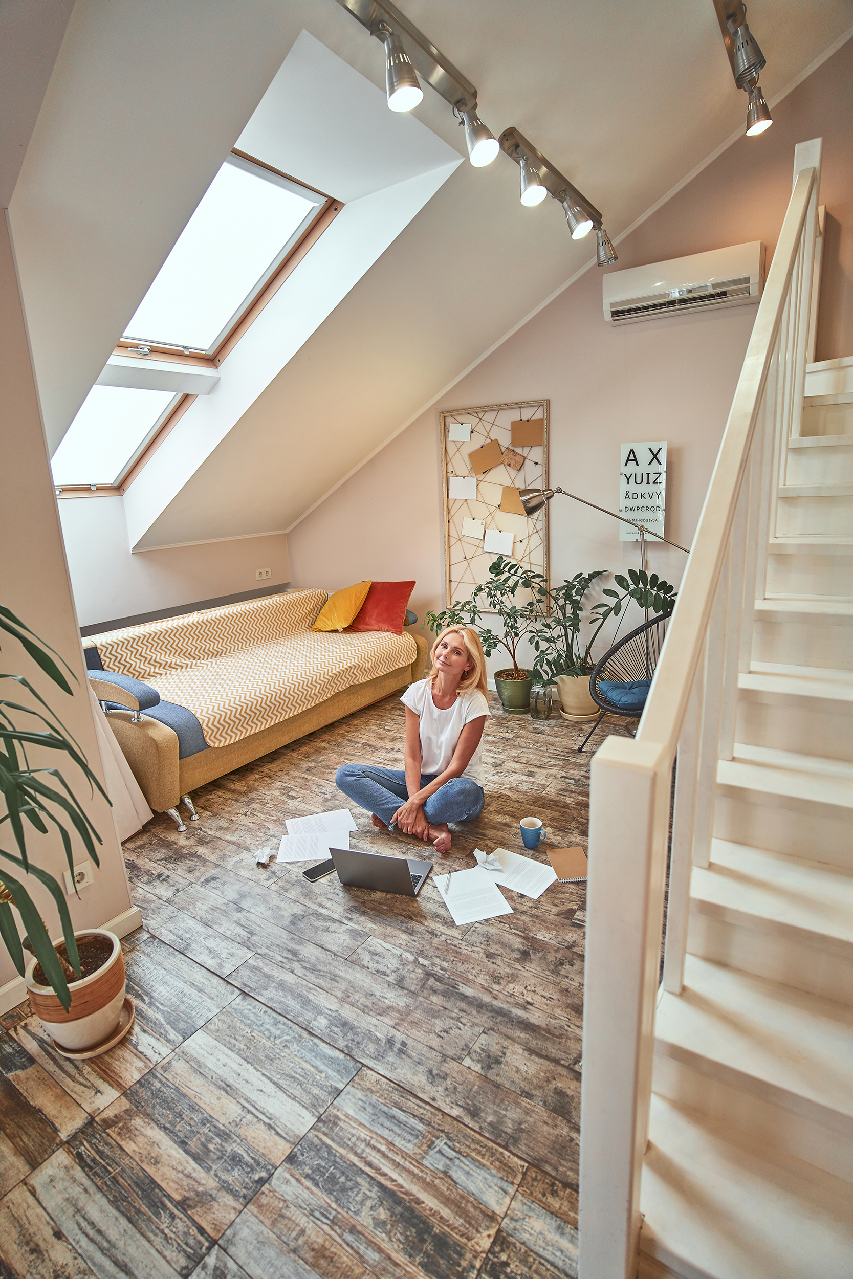 Living room with vented skylights.