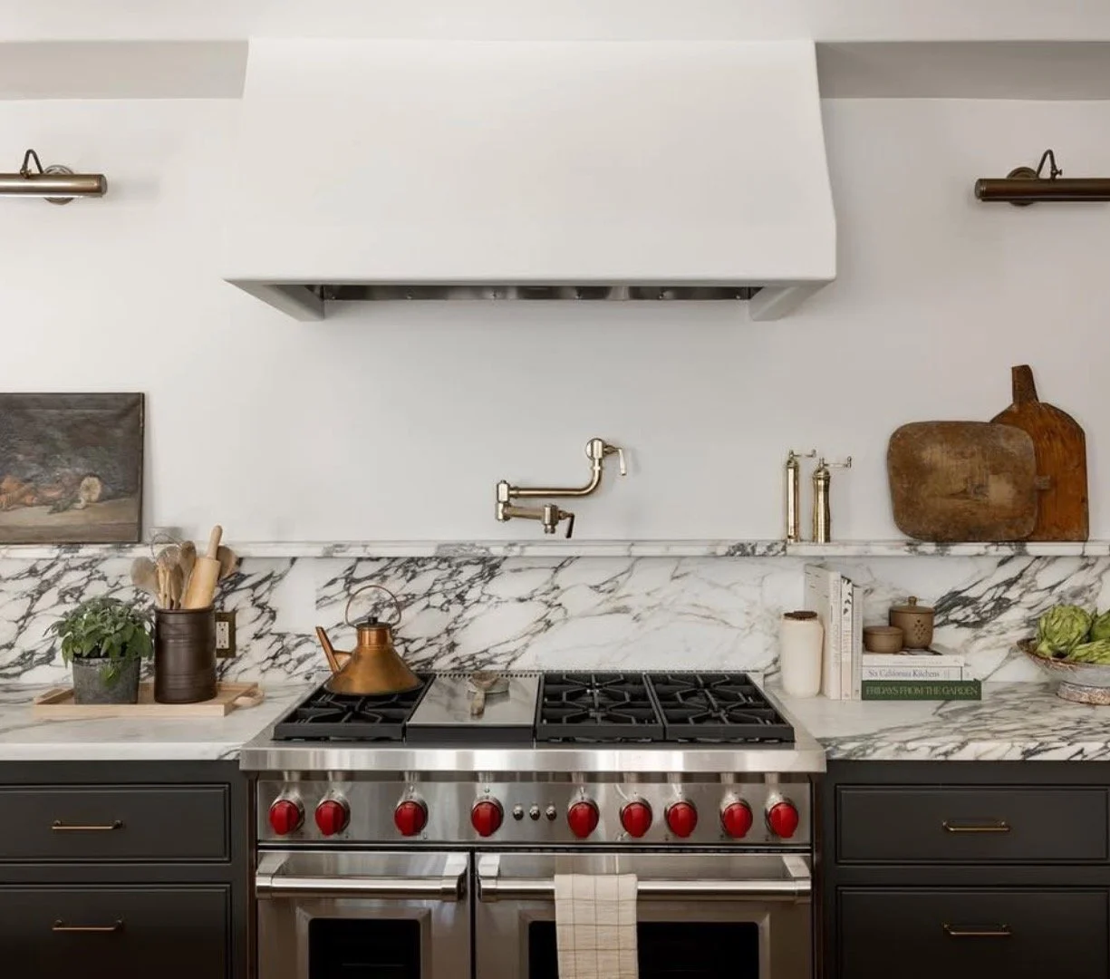 Hood style, grey color countertop, thin ledge over range