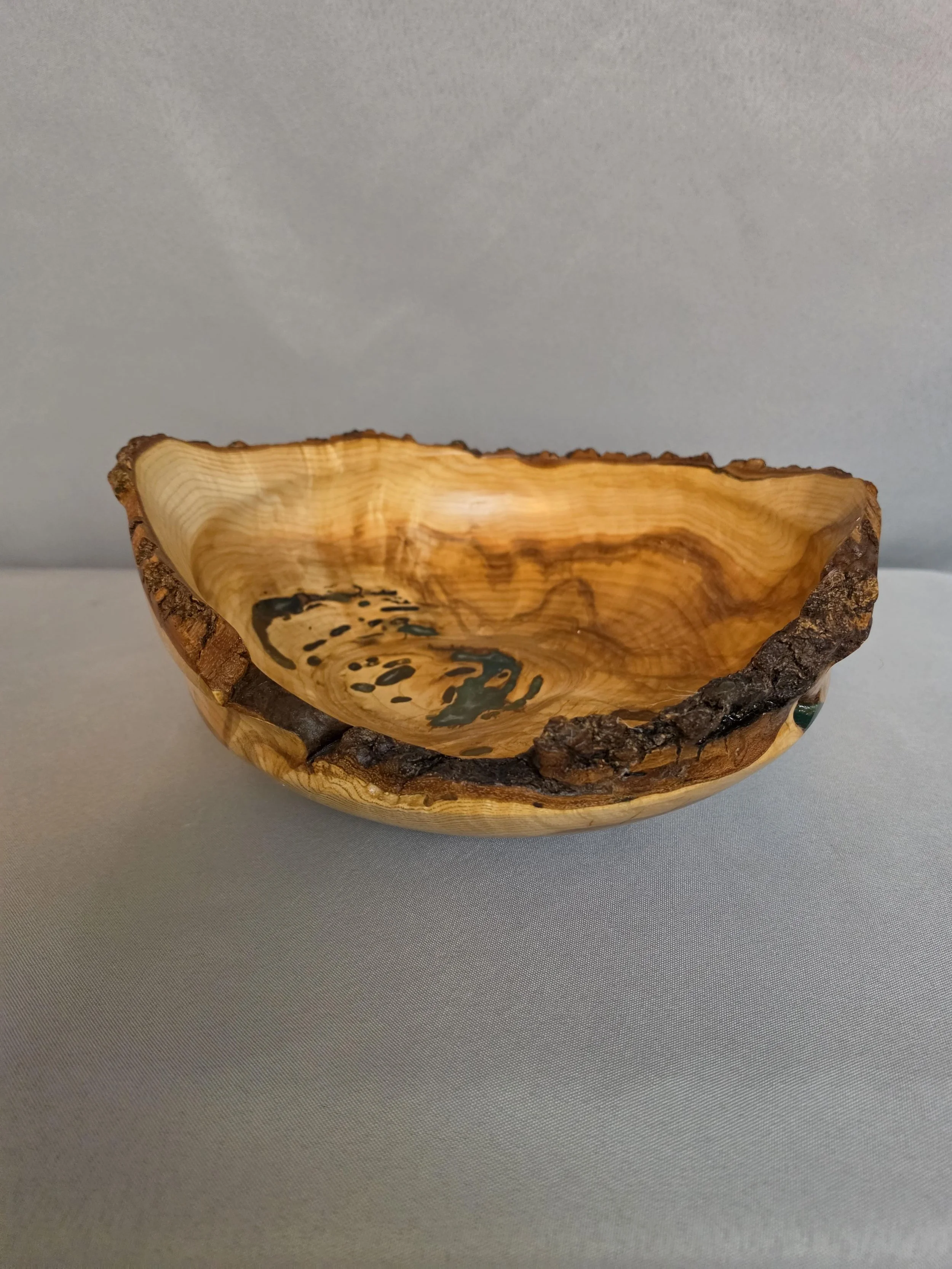 Maple burl with green epoxy live edge.jpeg