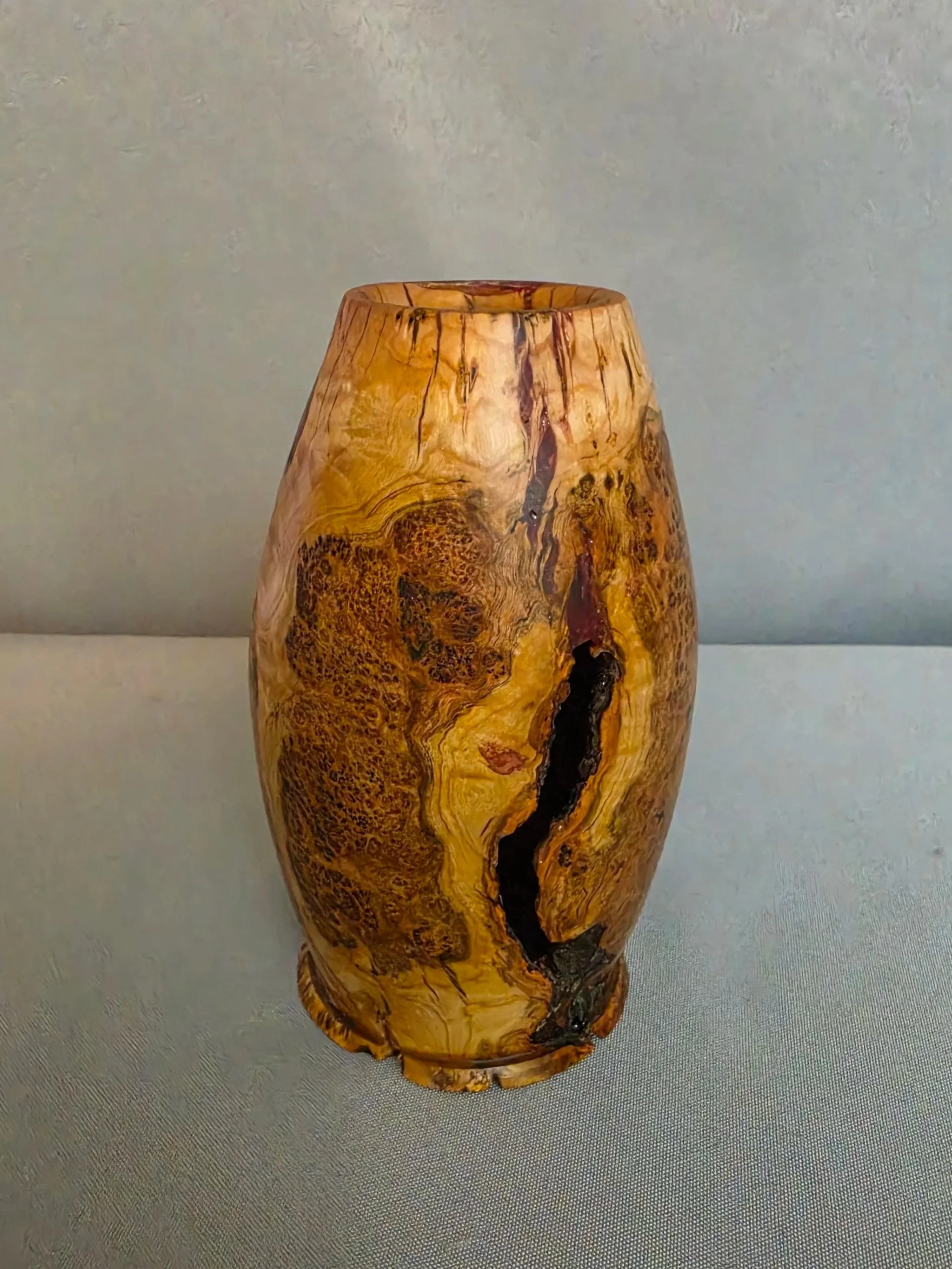 cherry+burl+vase+with+opening+and+red+epoxy.jpg