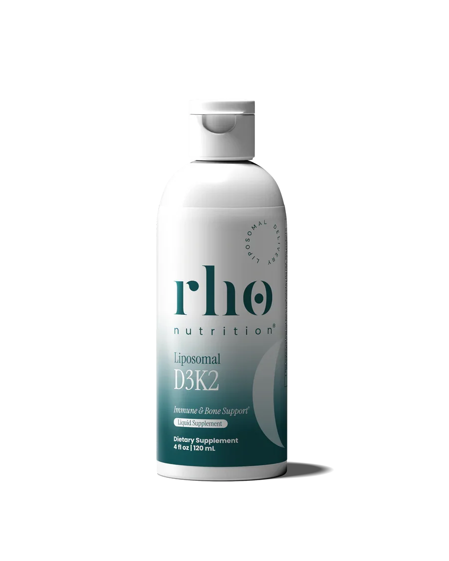 A white bottle of rhō nutrition Liposomal D3K2 dietary supplement with a teal and white label, featuring the product name and description, 4 fl oz (120 mL) in size.