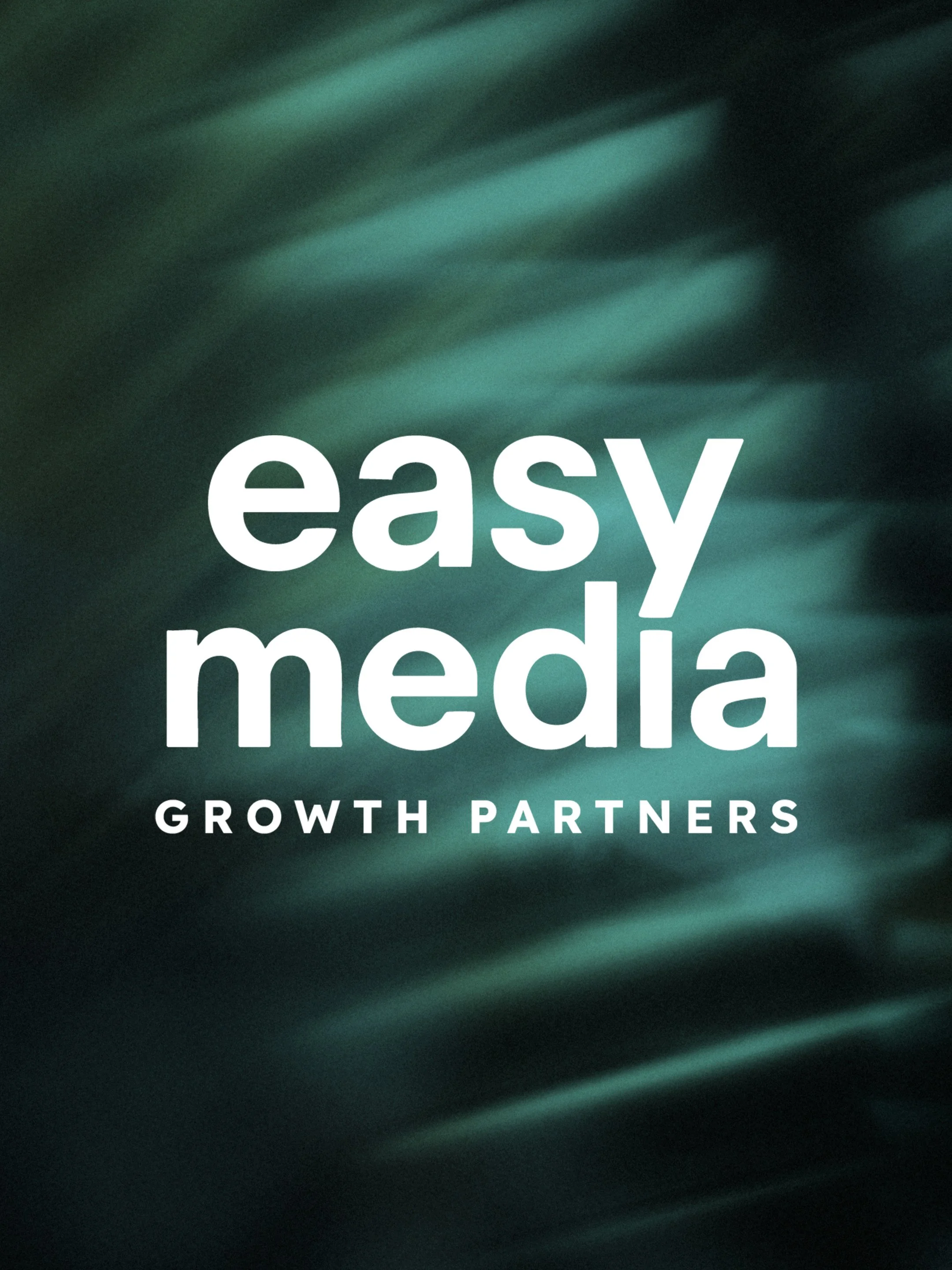 Text reading 'easy media GROWTH PARTNERS' over a dark green, abstract background.
