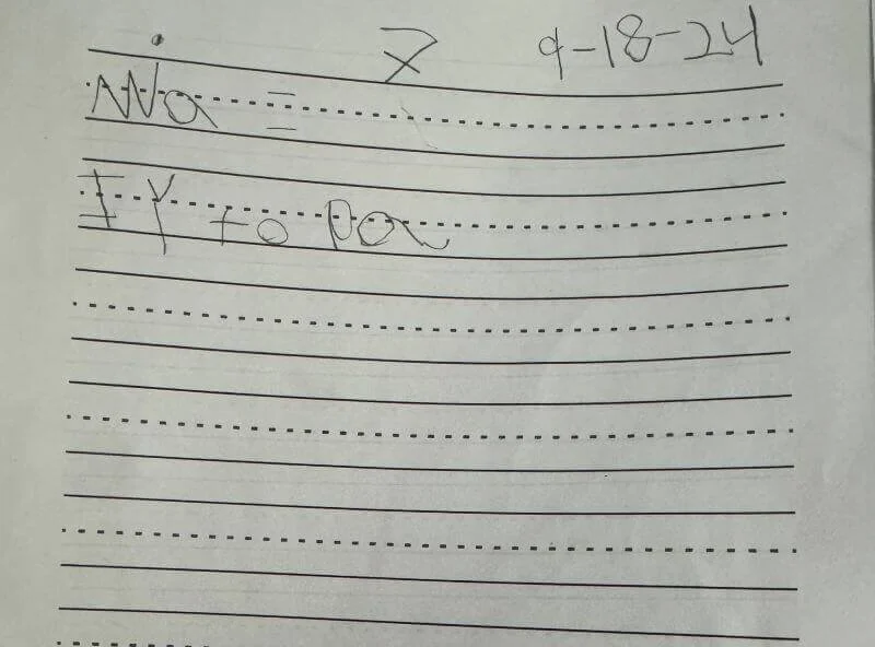 Student handwriting before dyslexia intervention showing letter reversals and spelling struggles — Fort Worth reading therapy results.