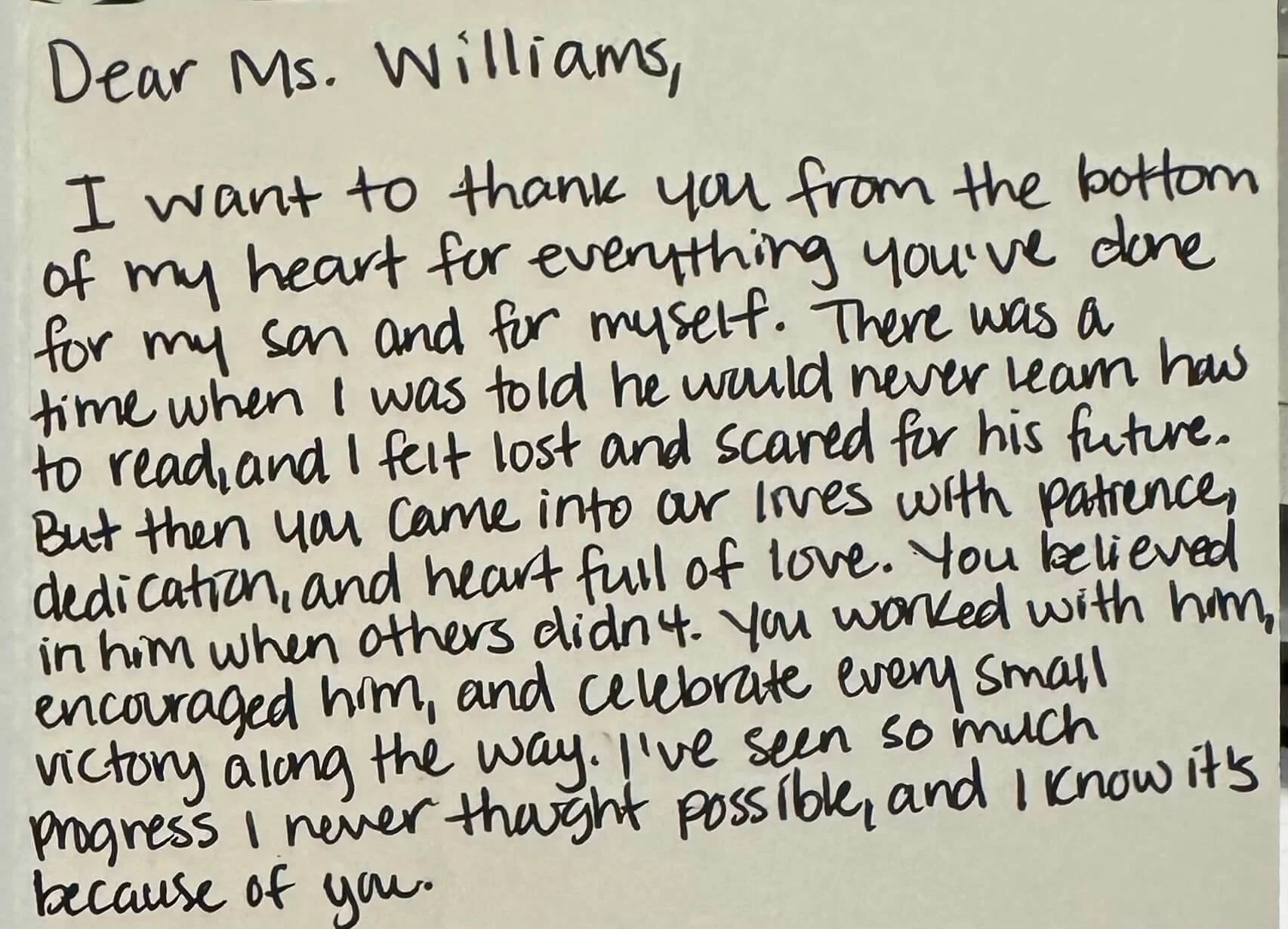 Grateful parent's handwritten testimonial about her son's successful reading journey with Blossoming Skills