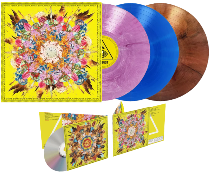A vinyl record set featuring a colorful, symmetrical, abstract design with pink, orange, blue, and yellow hues, including a yellow album cover with a similar pattern, and glimpses of the record's inner label.