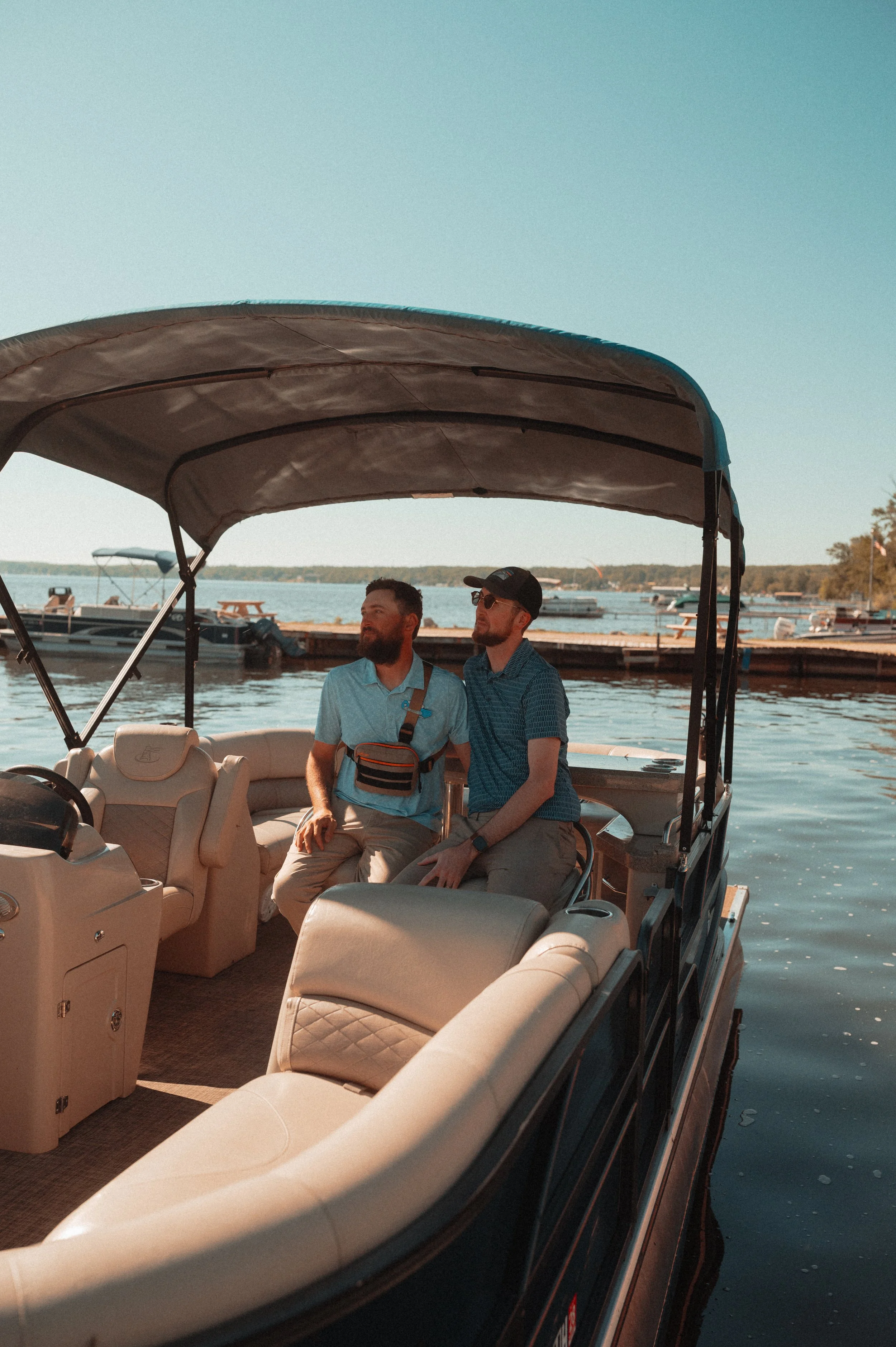 kevin and rick on a pontoon boat