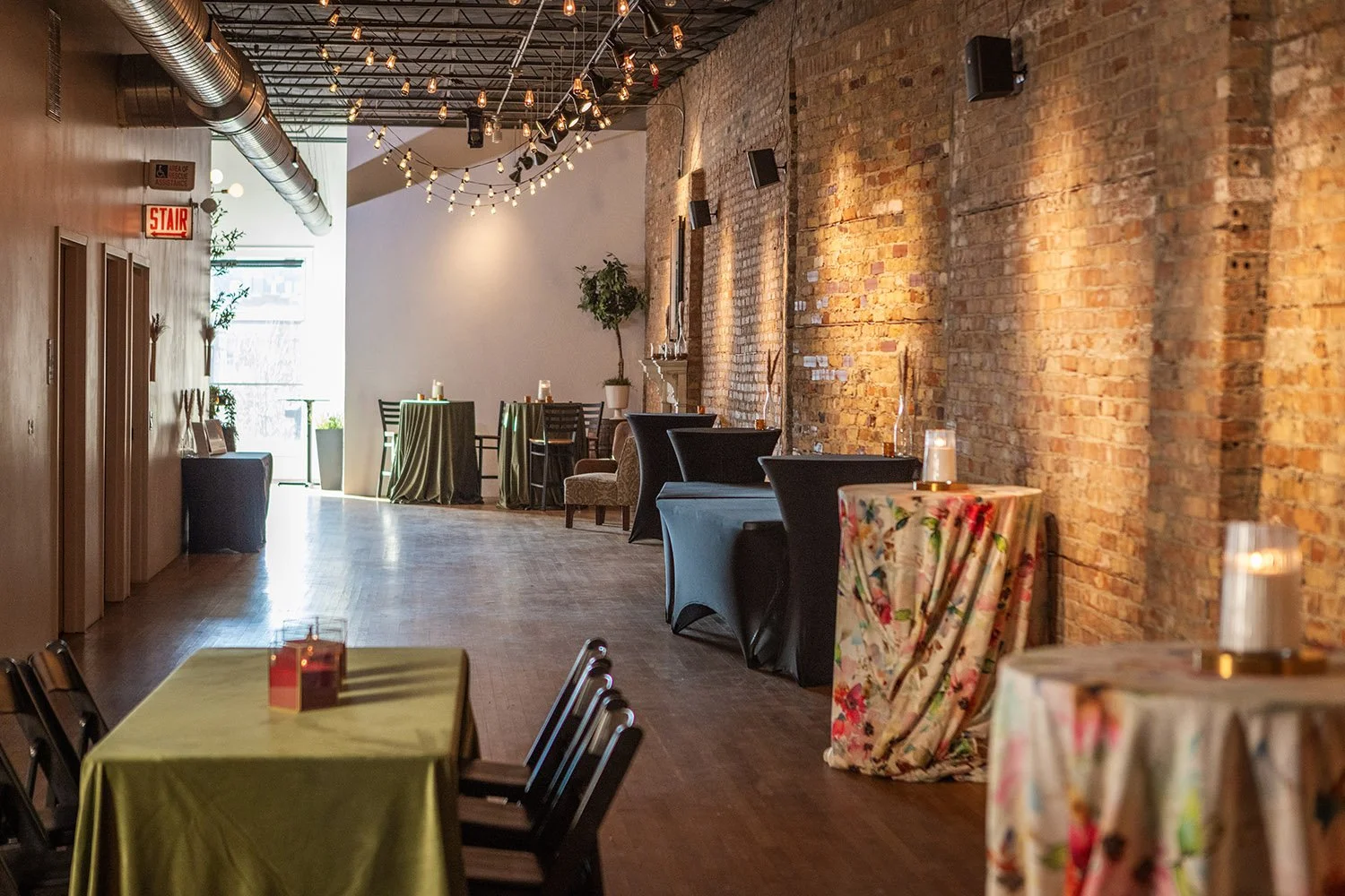 third floor loft tables set for dining at Tethered Events Chicago
