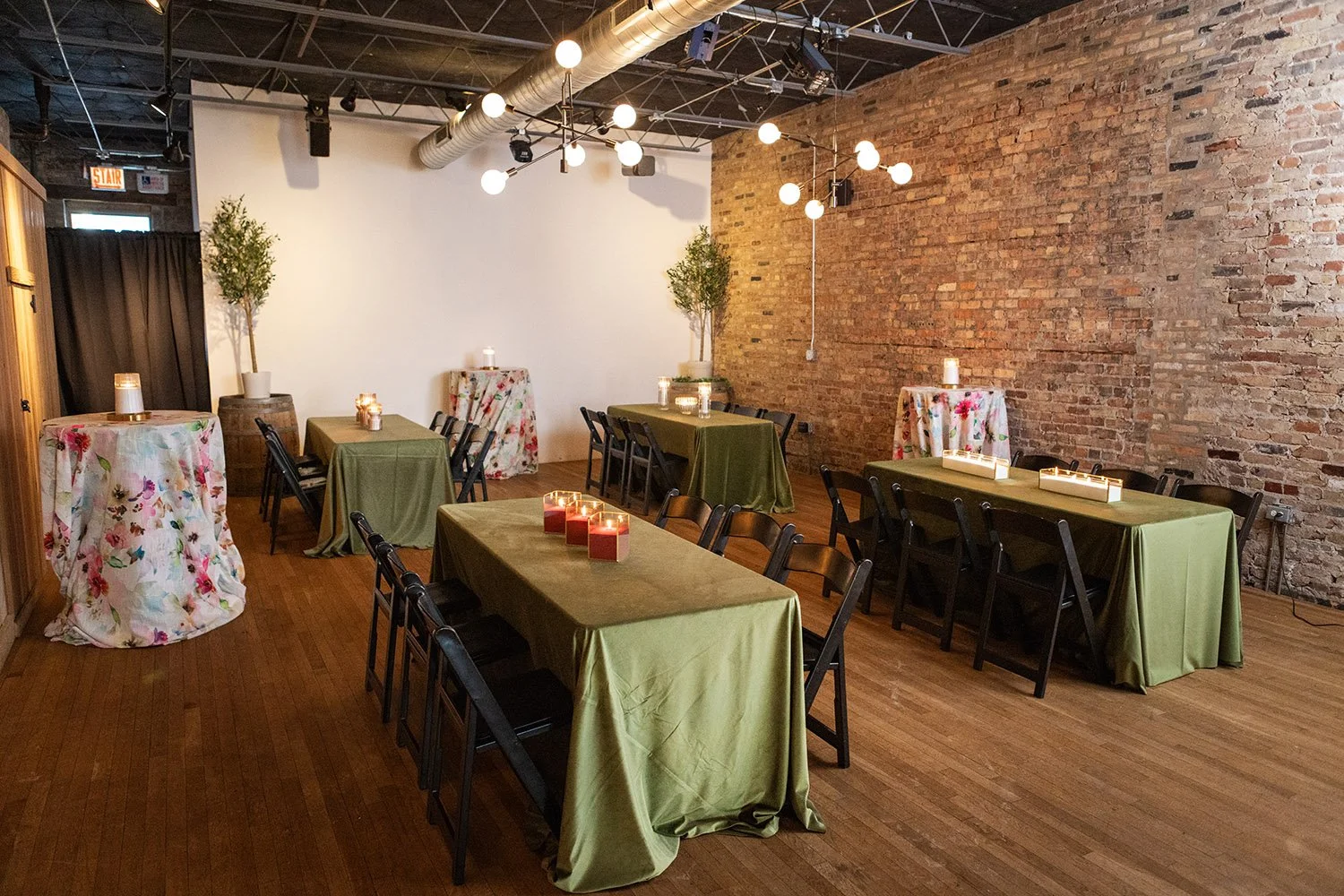 tables in third floor loft set with linens at Tethered Events Chicago