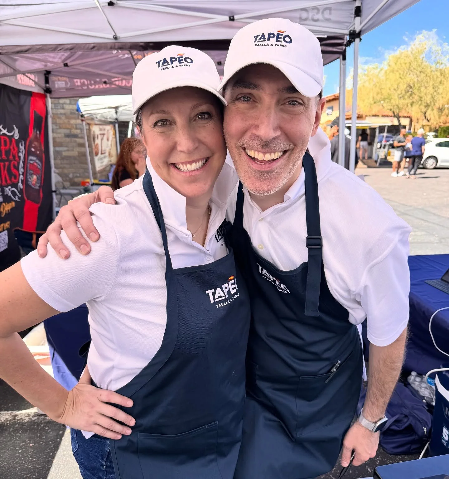 At Tapeo, a genuine smile is the core of our hospitality. It&rsquo;s a reflection of everything great. The camaraderie that shines through, our passion for Spanish paella and tapas, and excitement about the craft. When we love what we do, the smile o