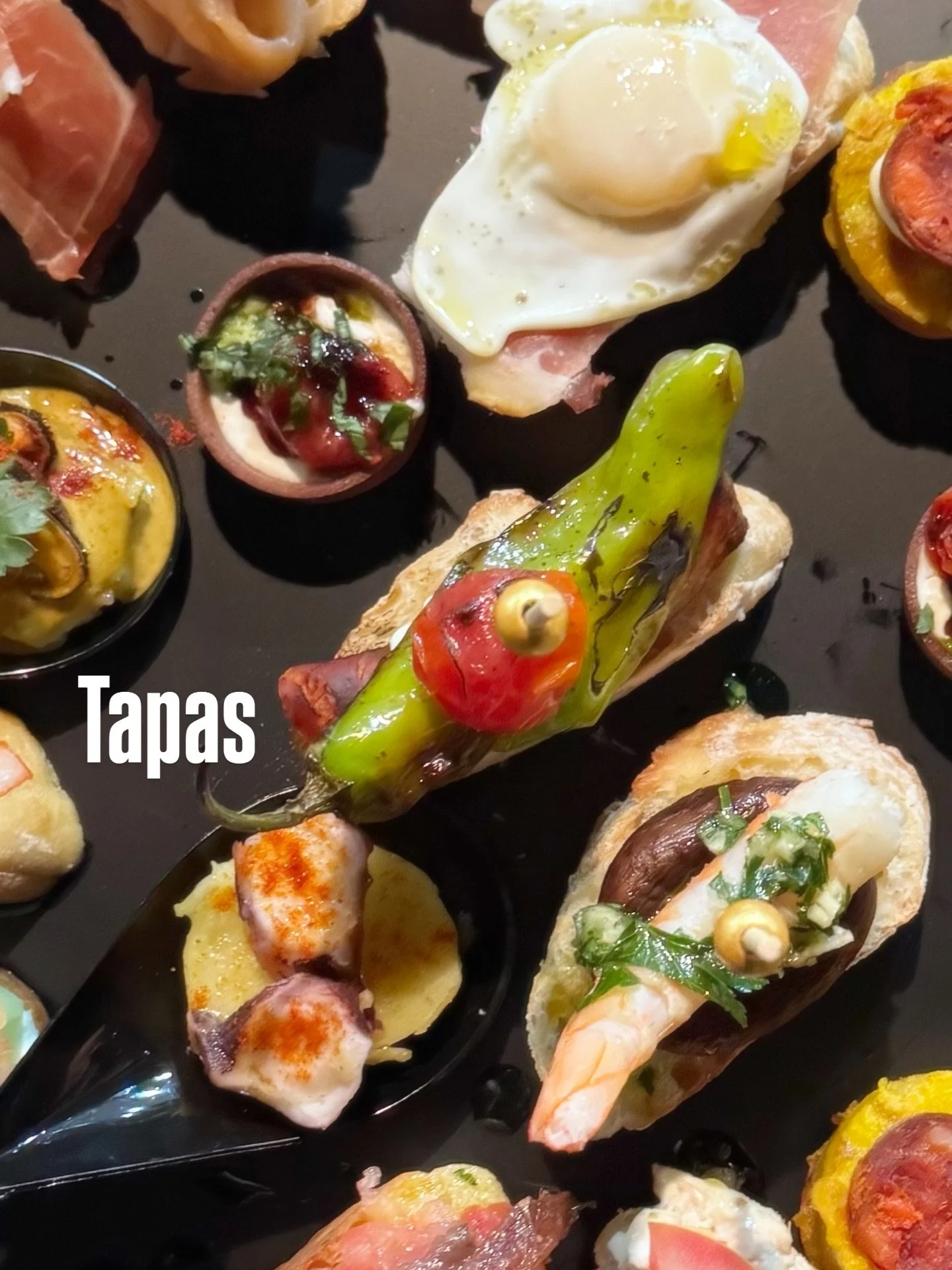 At Tapeo, it&rsquo;s about the care in every tiny detail. We treat every tapa like a little piece of art. From the way the olive oil catches the light to that first incredible explosion of flavor that hits you, we pour our hearts into making every bi
