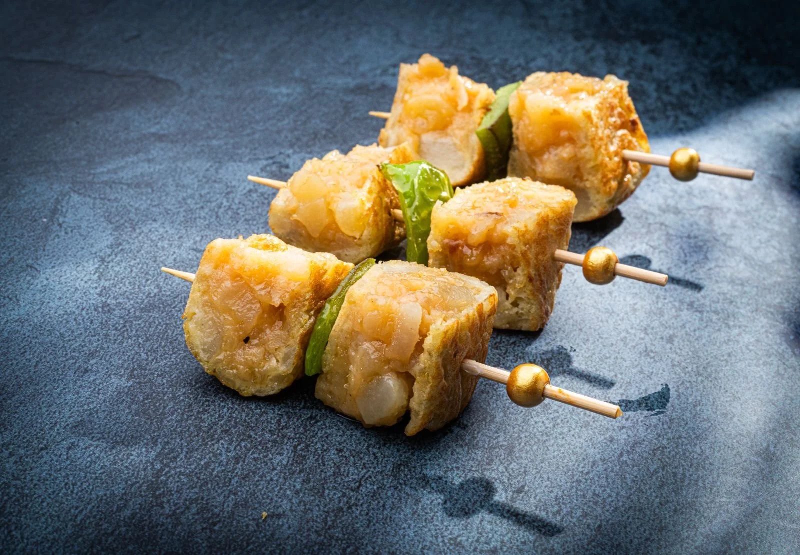 What do you traditionally serve with Paella?