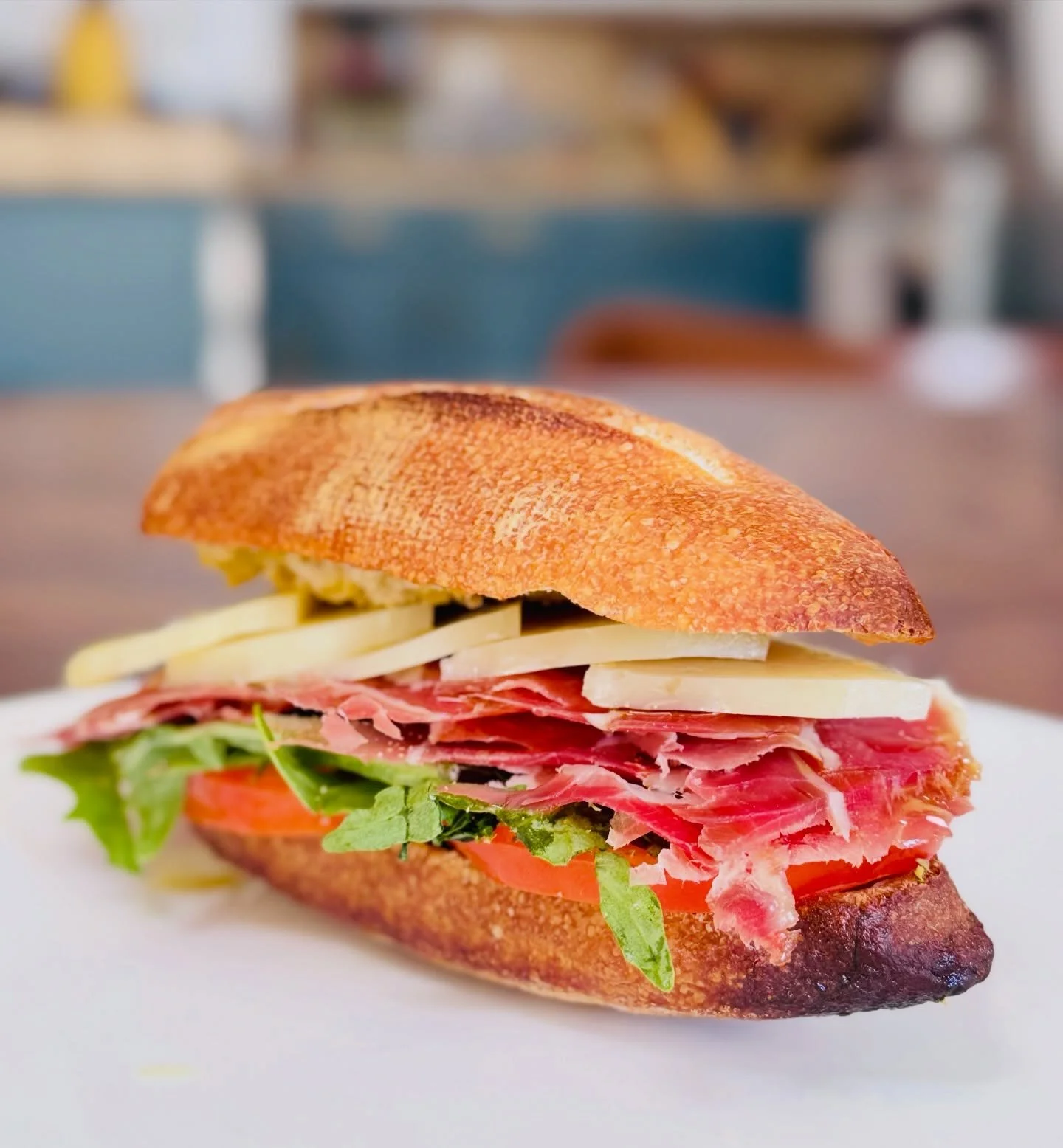 Elevate your next corporate gathering with the authentic crunch of Spain! 🇪🇸 Our signature Bocadillos de Jam&oacute;n Ib&eacute;rico y Queso Manchego are more than just a lunch&mdash;they are a gourmet experience featuring artisanal crusty bread, p