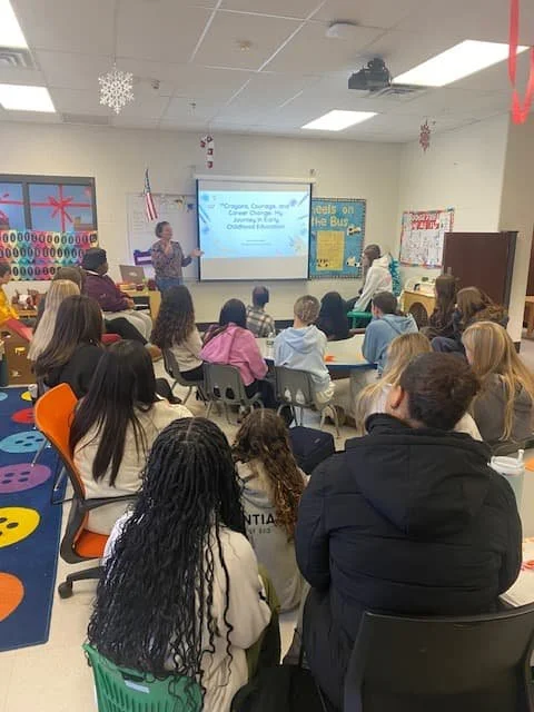 Guest speaker presenting to high school students about teaching philosophy at Taunton High School
