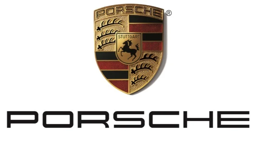 Porsche logo featuring a gold shield with black and red accents, including a horse and the word 'Stuttgart', with 'Porsche' written below.