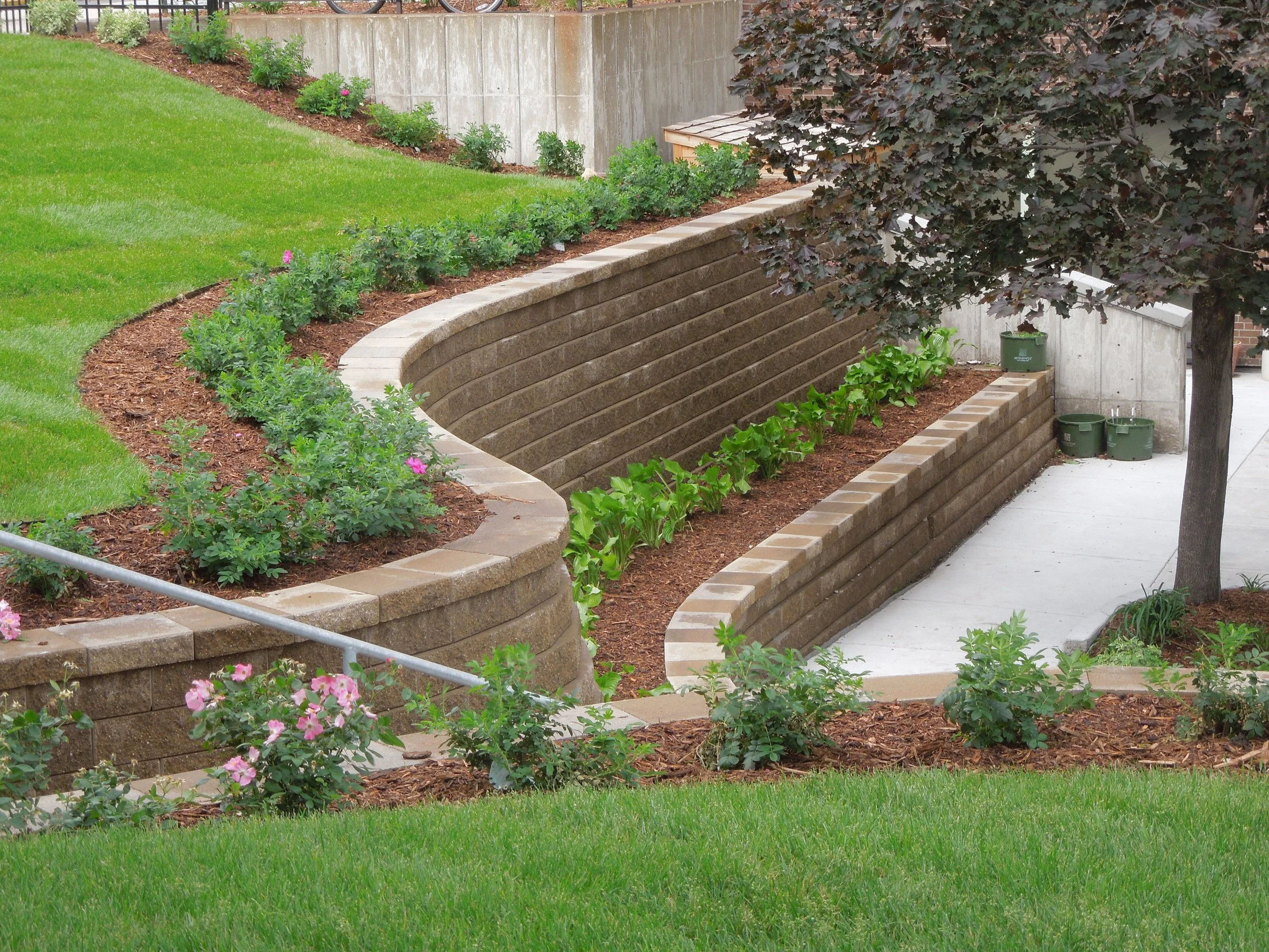 Earthen Arts MN Landscaping retaining wall ornate stone wall landscape