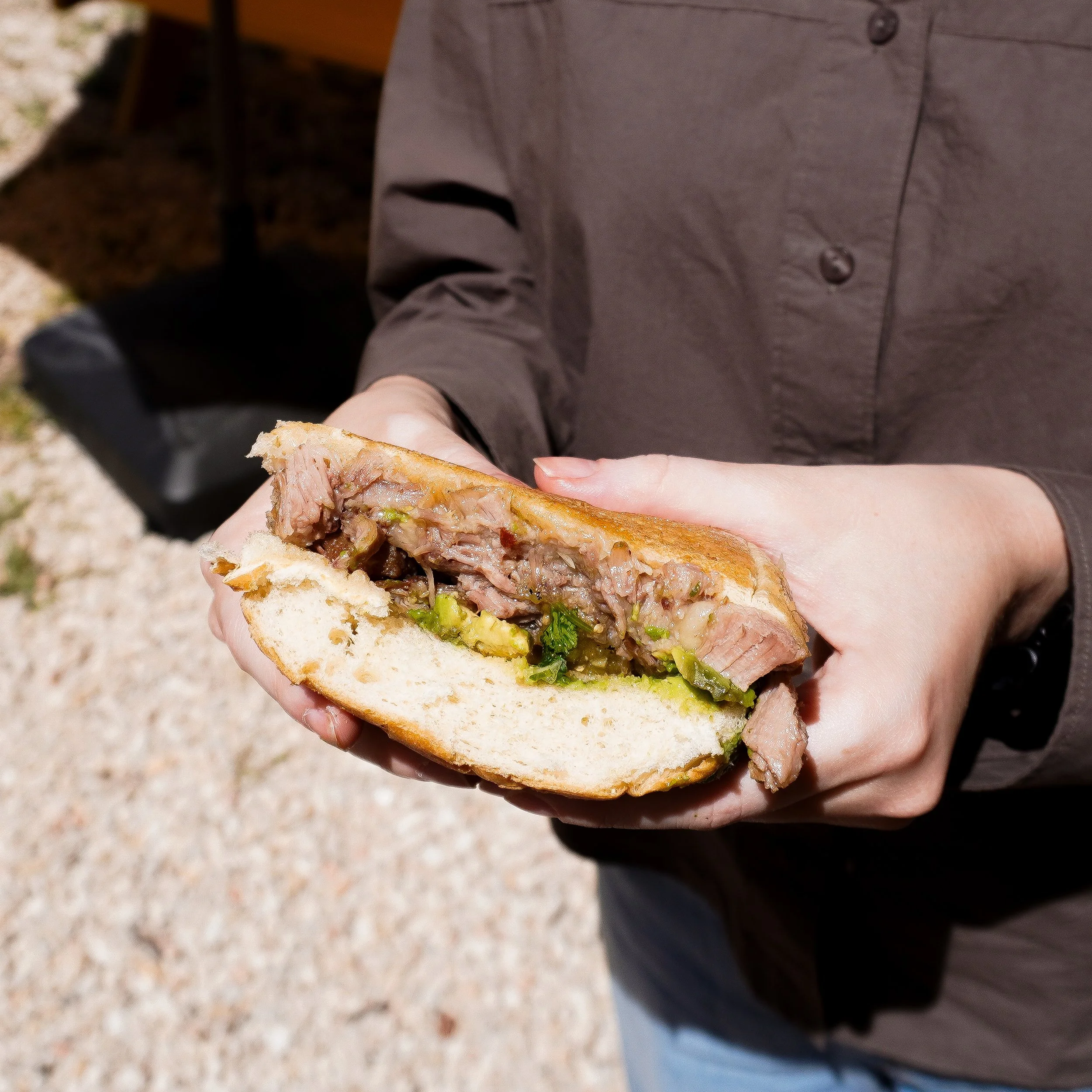 Carnitas torta with avocado 