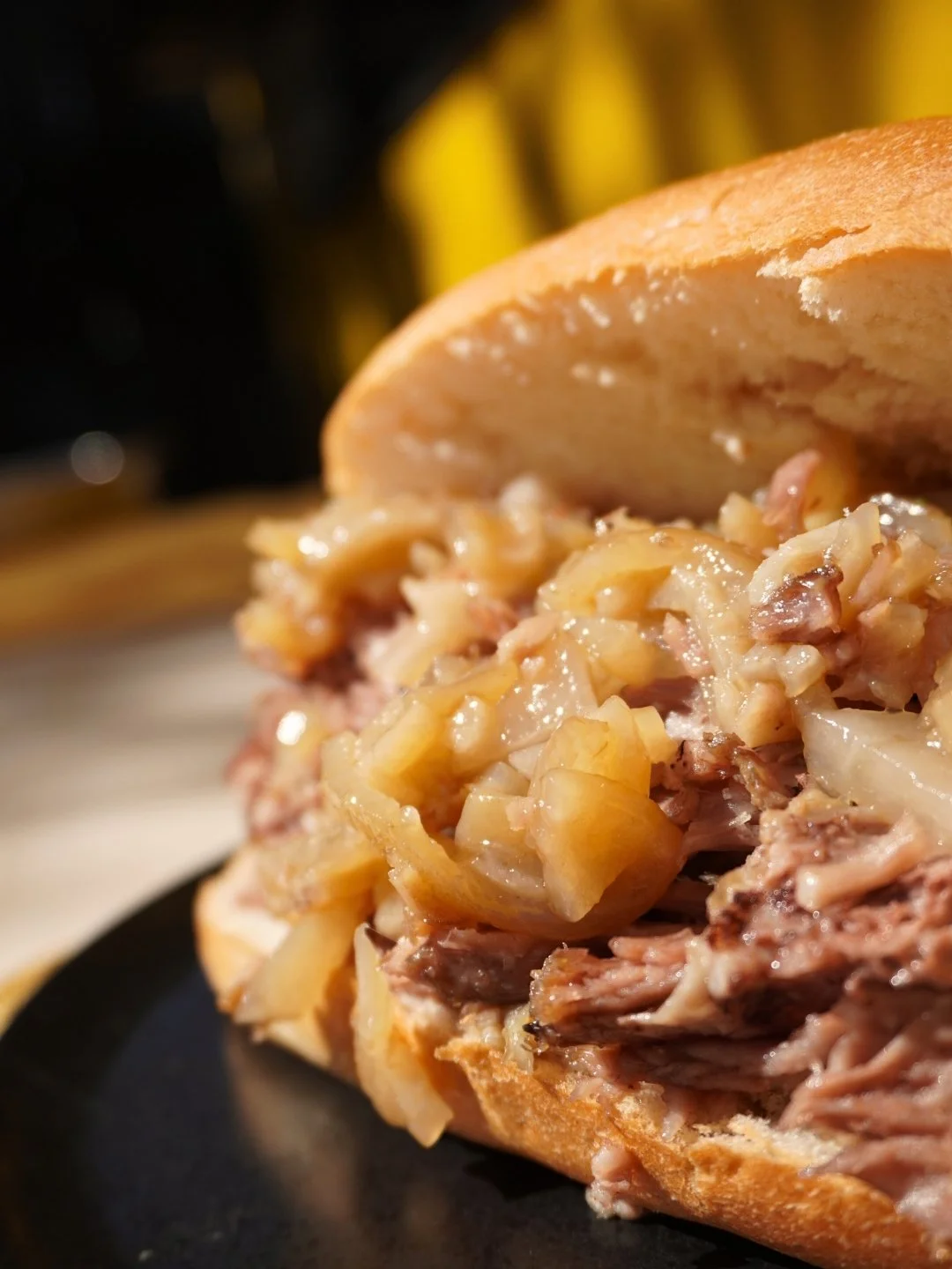 torta filled with carnitas and cueritos