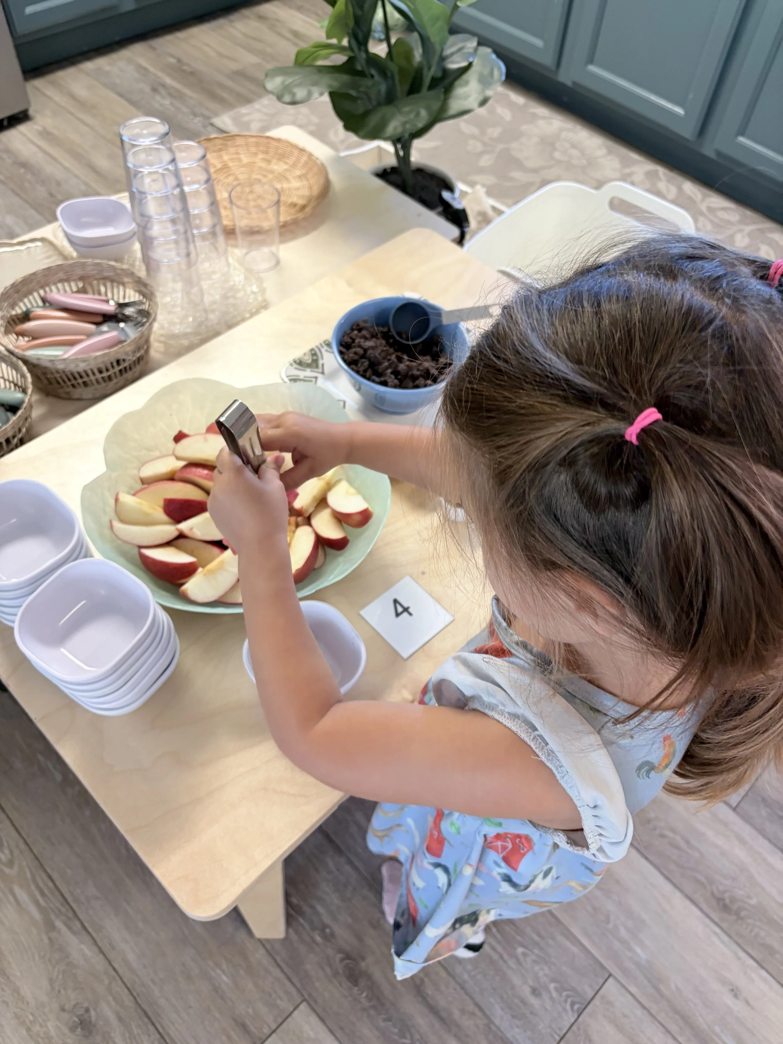 child serving snack 