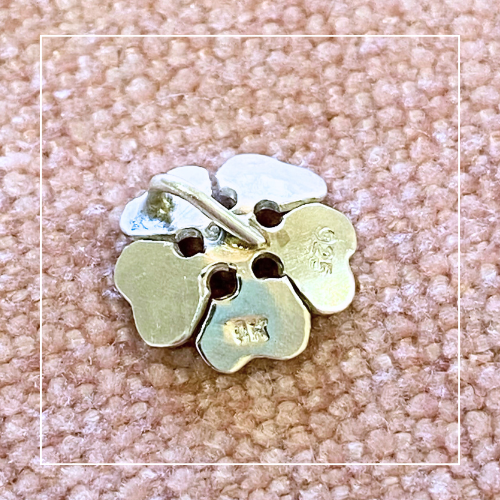 Stirling Silver flower bloom small pendant back Forged with Grace and Joy.png