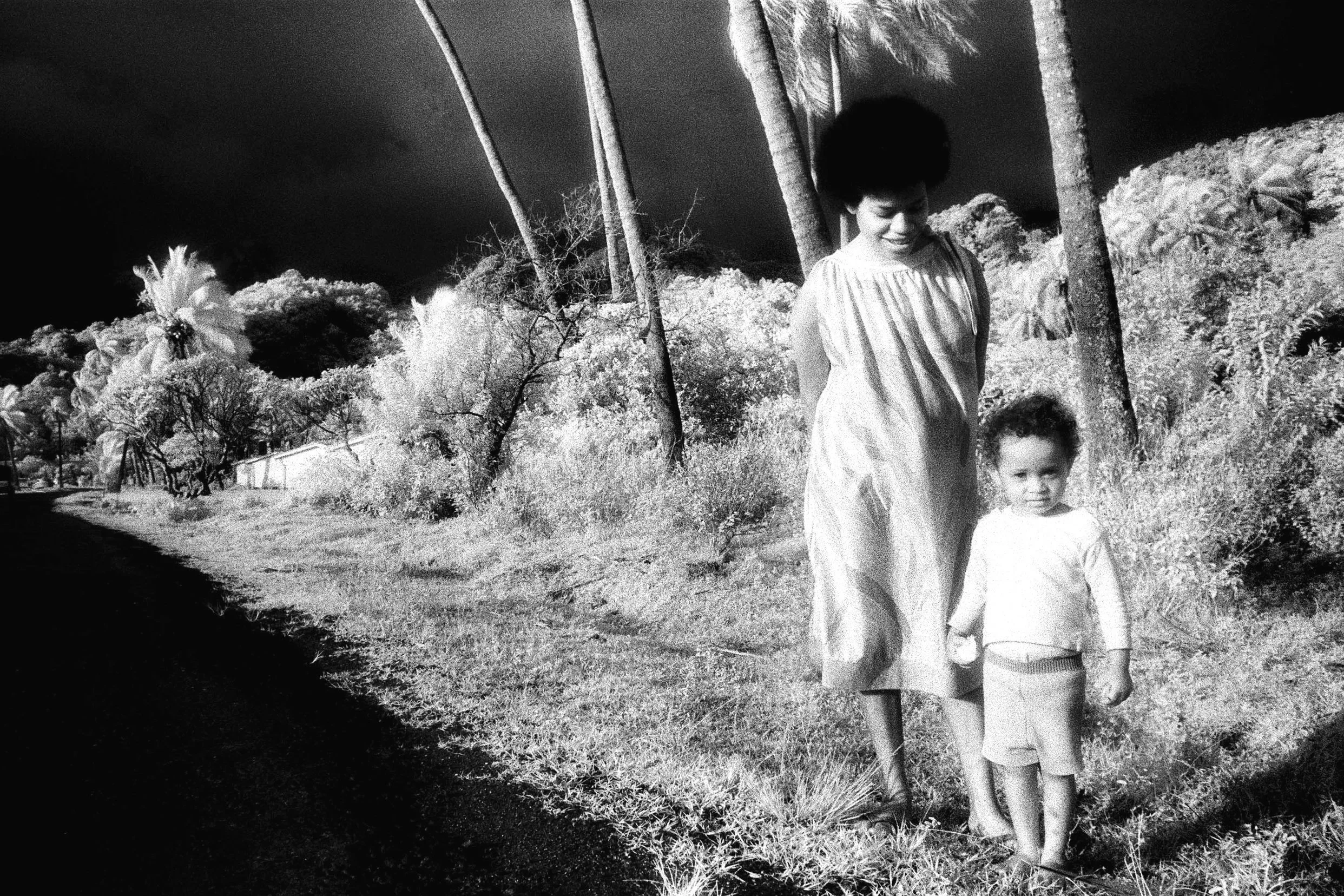 Mama and her son. Remote Fiji. black white infrared photo