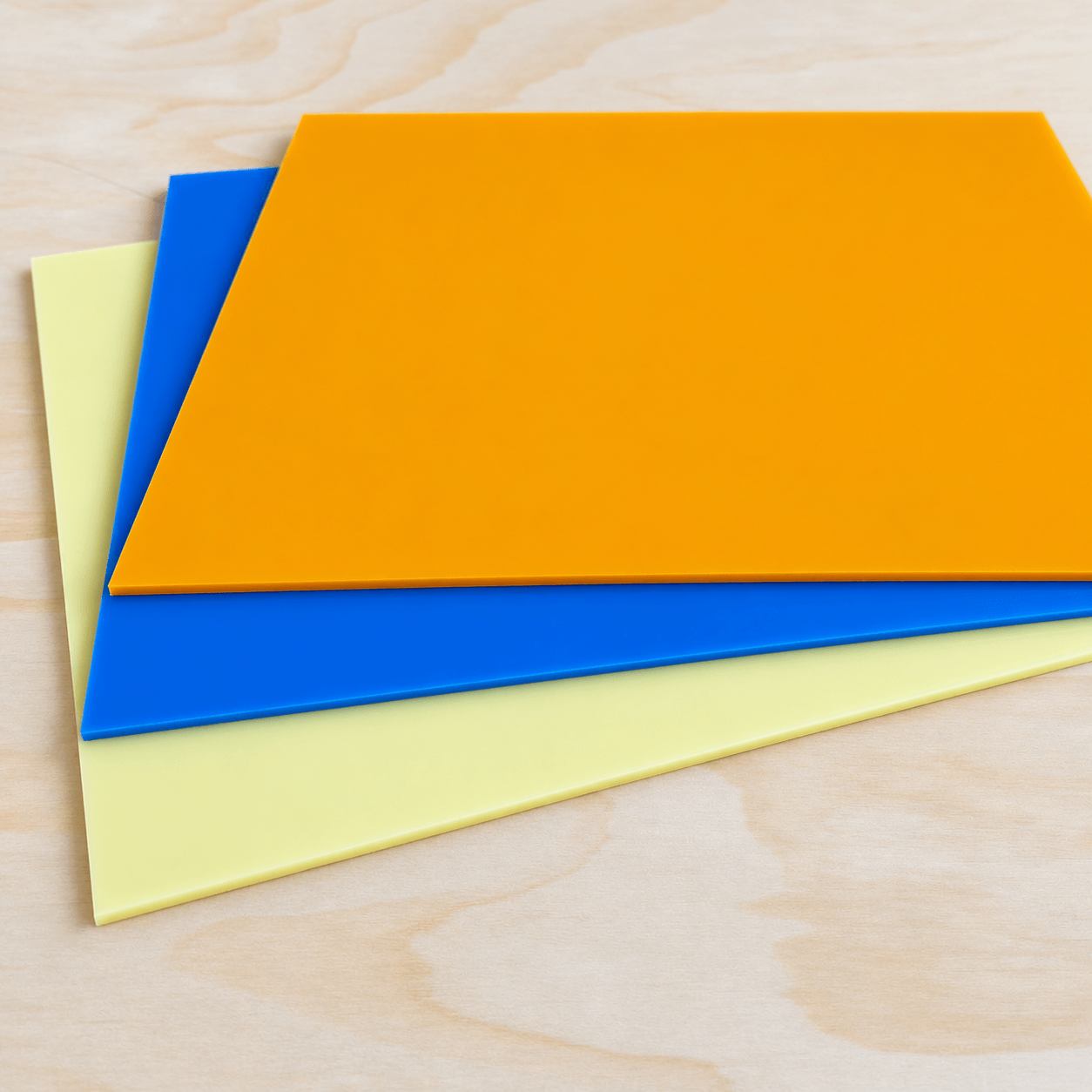 An image from the side of the 3 colored cast acrylic sheets in the Playful Party 3 Pack 3.png