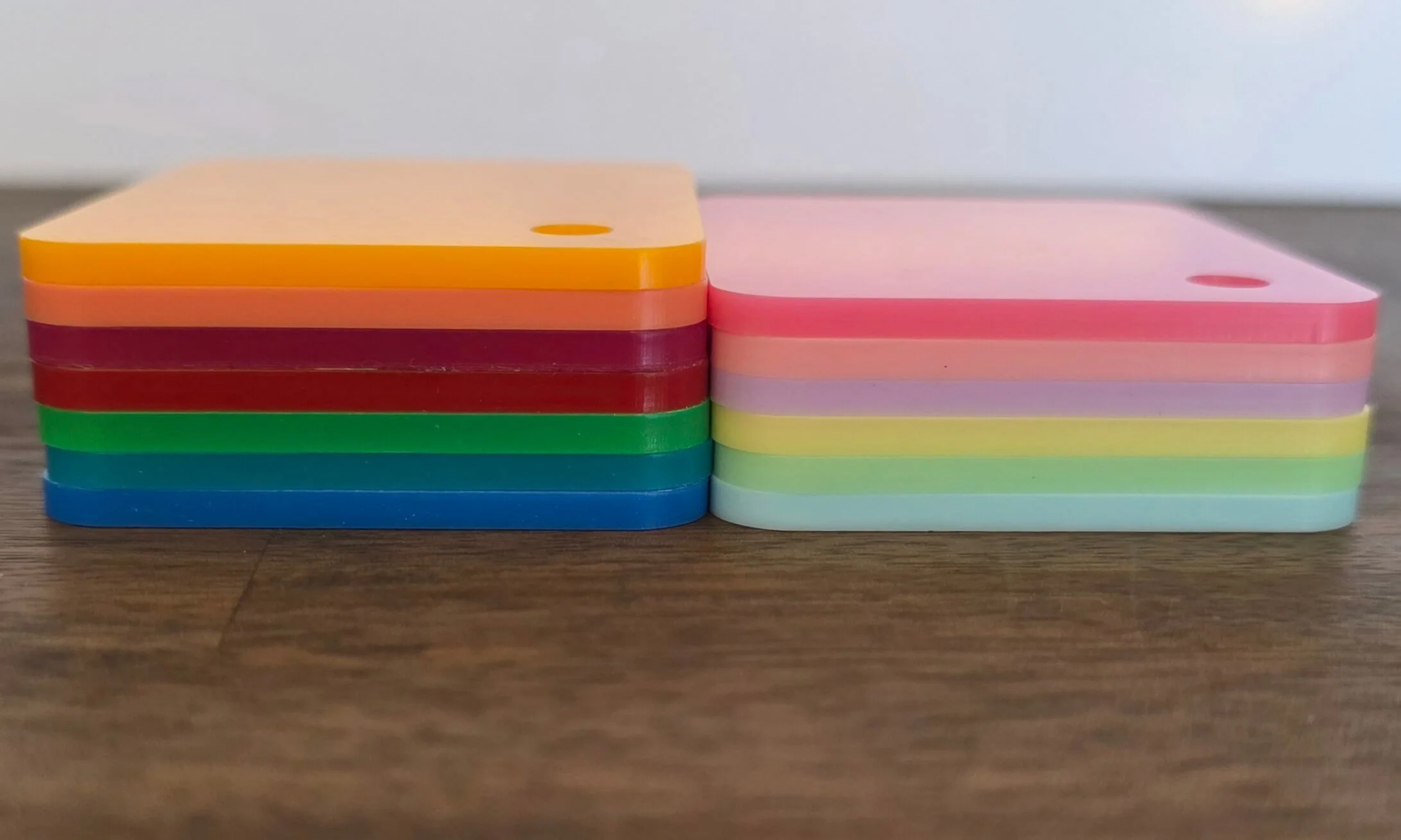 two small stacks of acrylic showing edge cutting quality