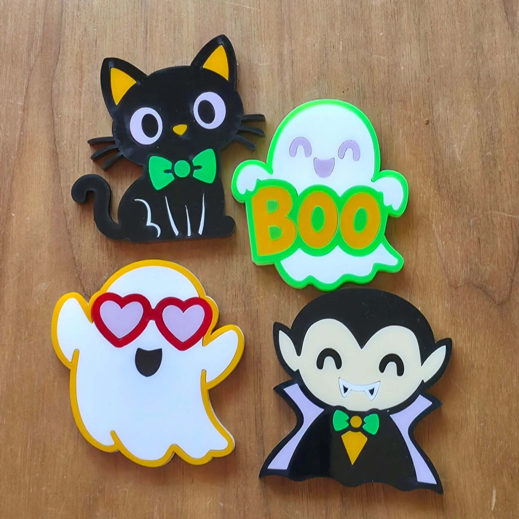 picture 2 of 3 of the colorful characters we laser cut from the Halloween night cast acrylic sheets color palette.