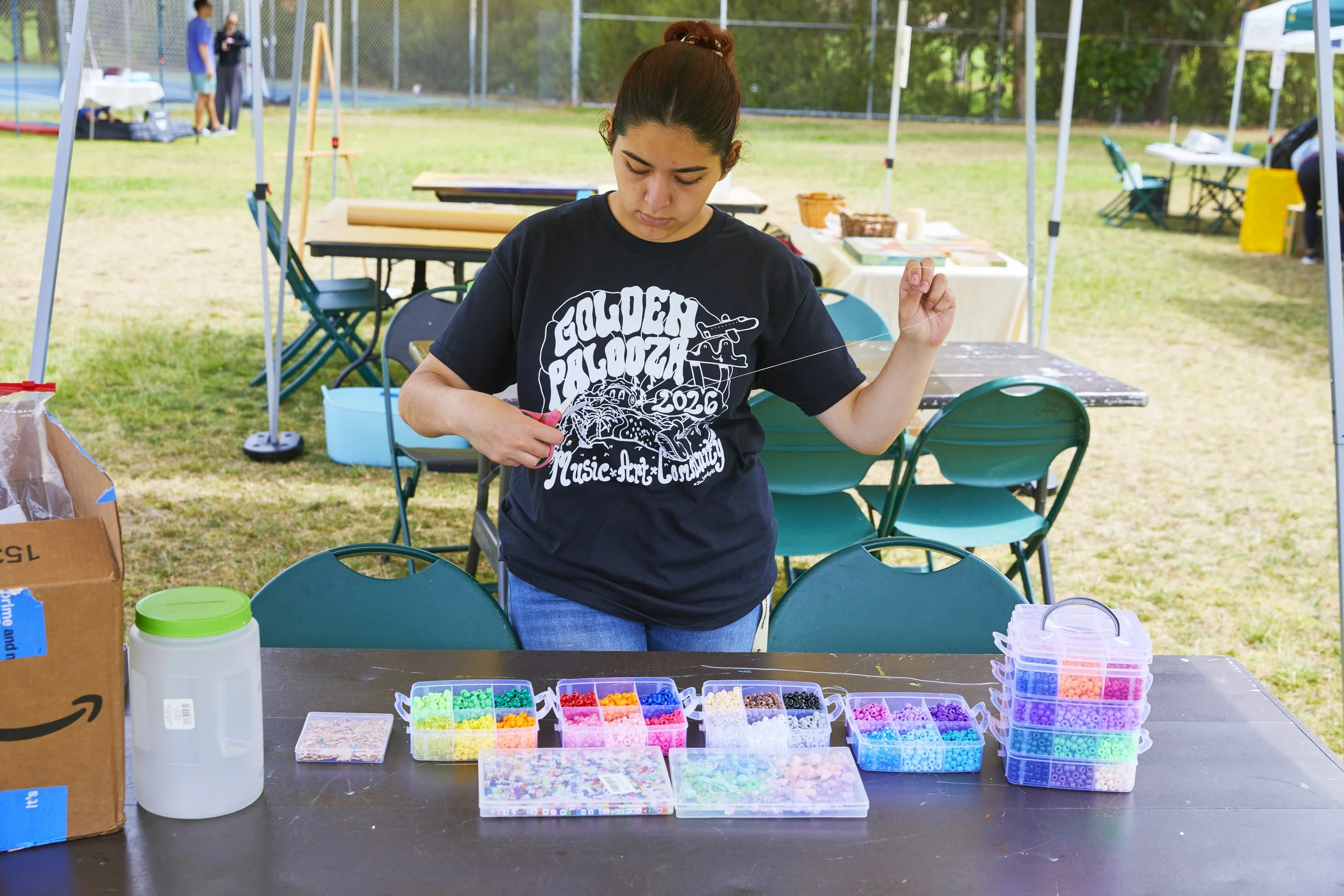 A volunteer preparing a hands-on activity. Photo by James Bueti