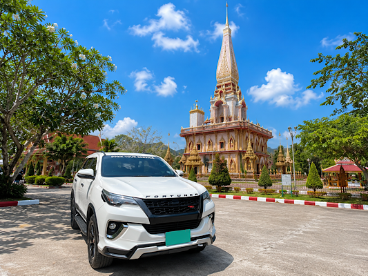 Private Phuket City Tour with SUV and driver visiting cultural landmark.