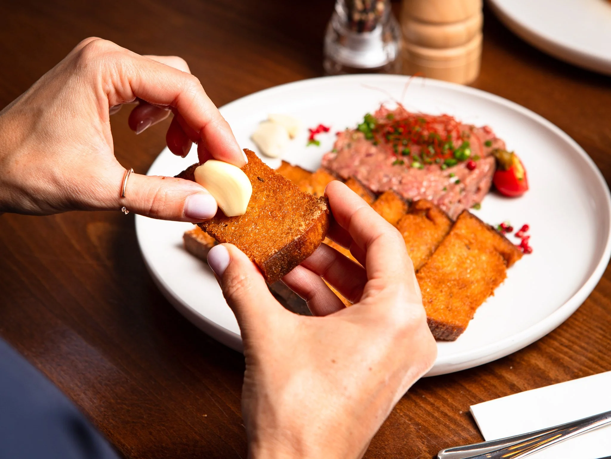 Czech beef tartar with bread and garlic.