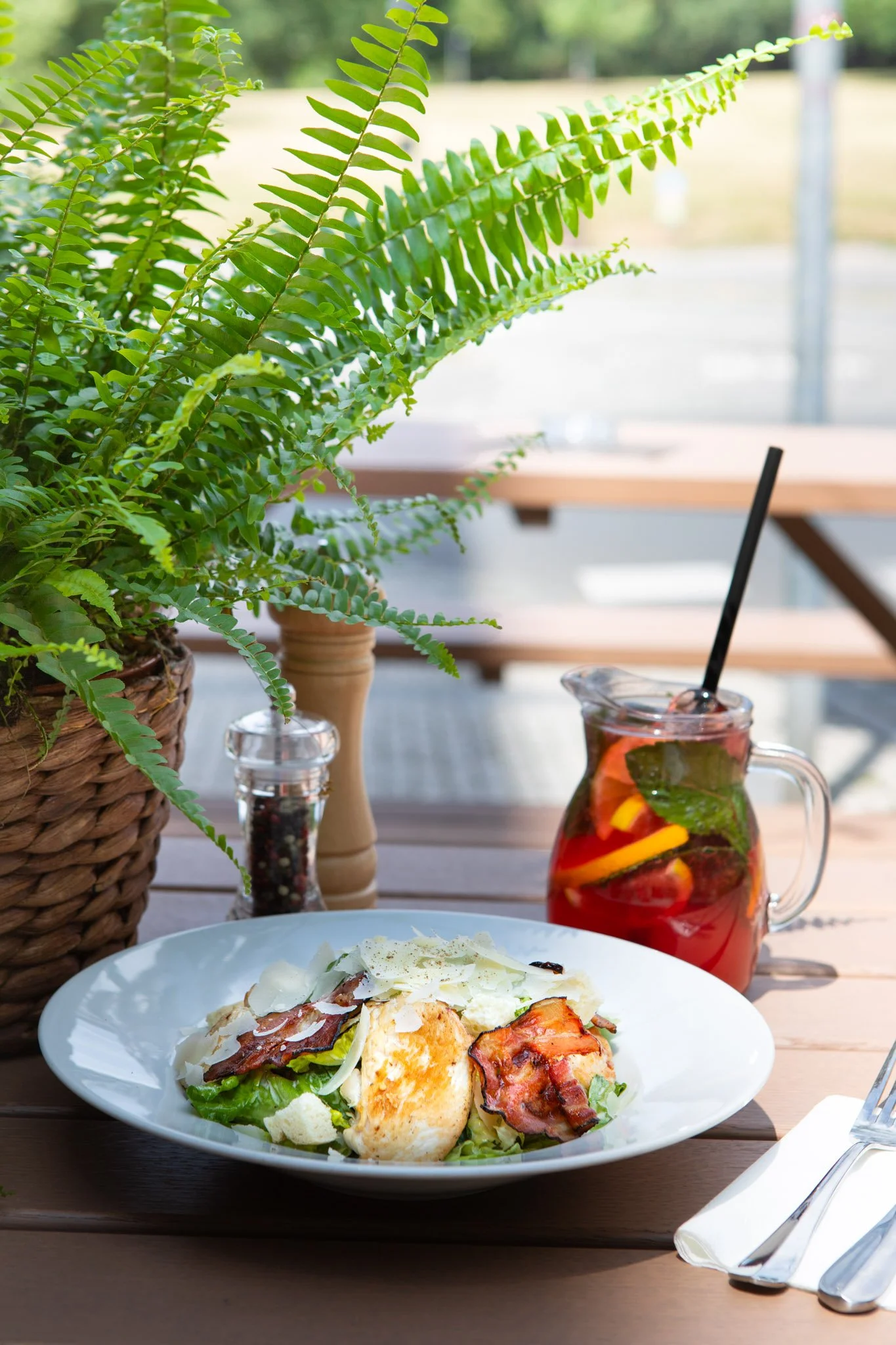 Outdoor seating Czech restaurant, Caesar salad.