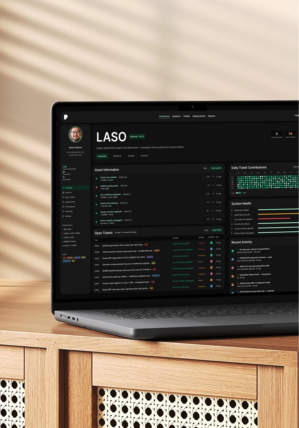 LASO legacy application support dashboard on laptop.