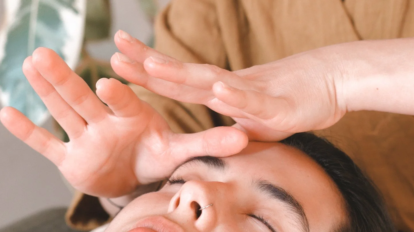 Close-up of hands performing a traditional Kobido facial massage in Berlin, focusing on lifting and rejuvenating techniques