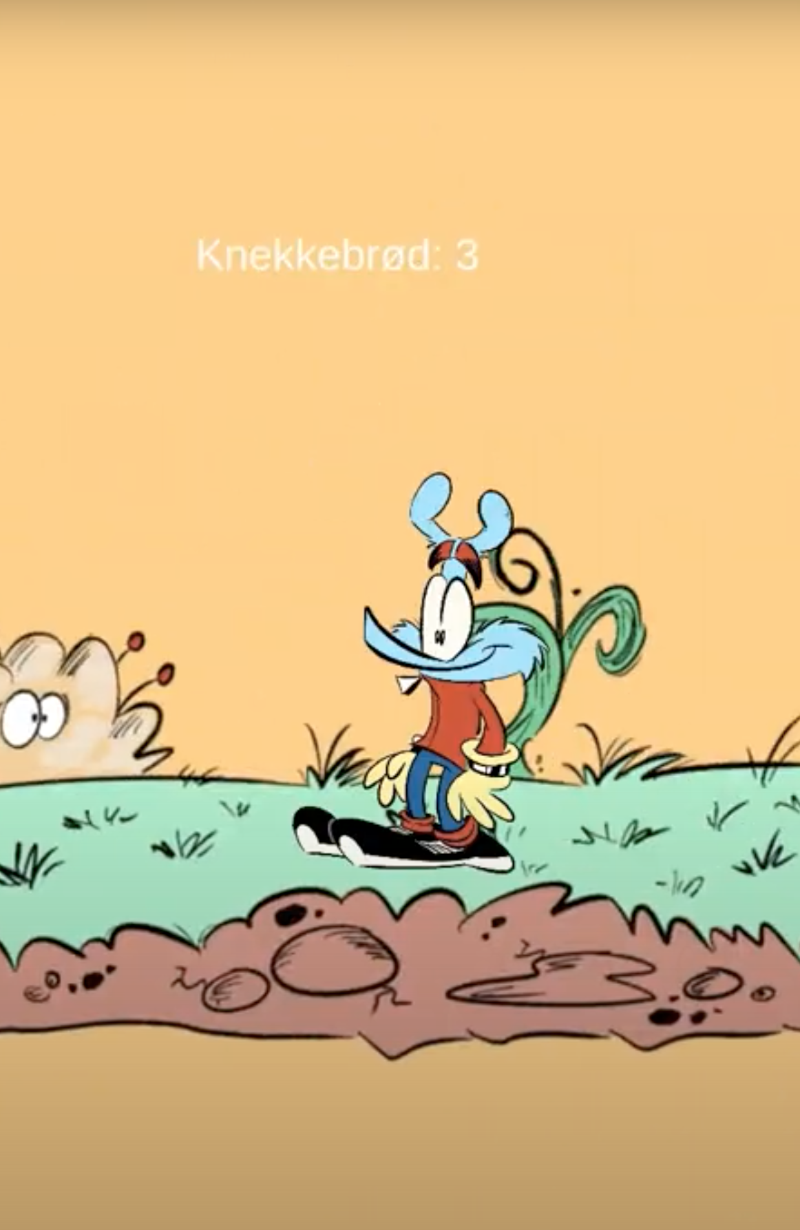 En tegneserie-illustrasjon av en skjeggorm med rød t-skjorte, blå bukser og en grønn krans, som står på en grønn snørekke, med et lite skilt som sier 'Knekkebrød: 3'.