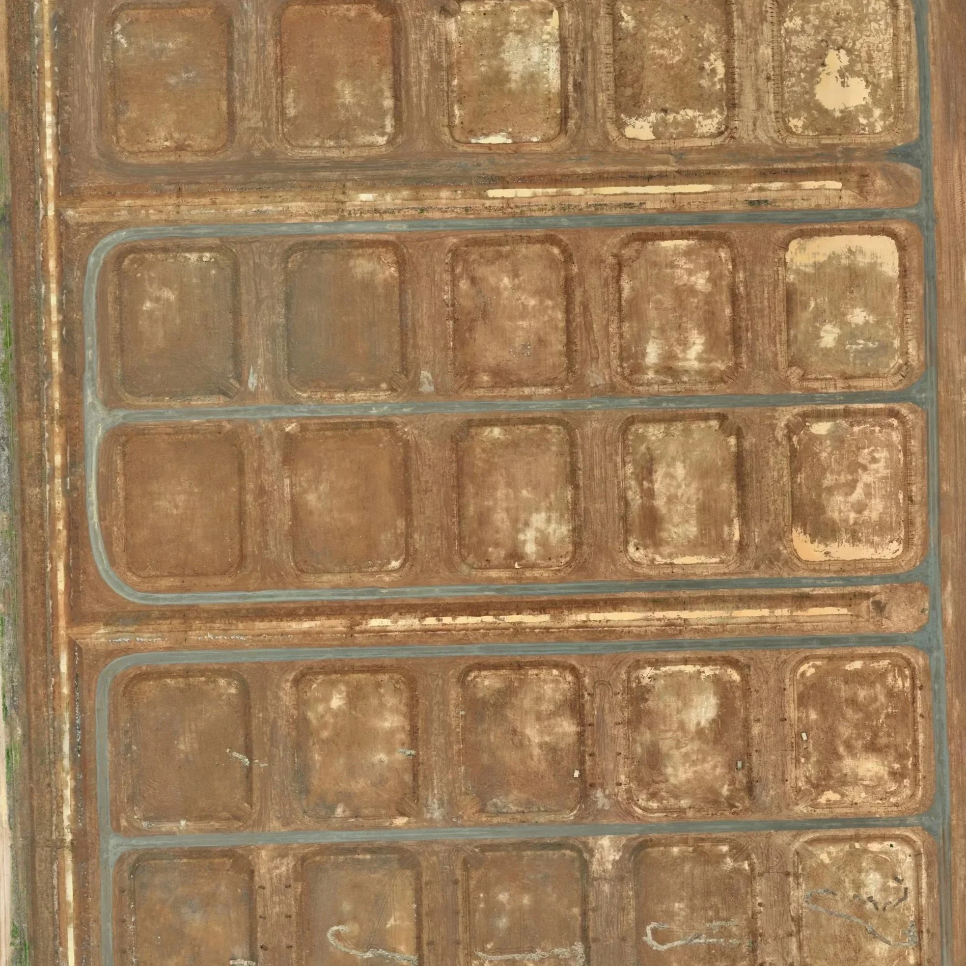 An aerial view of a construction site where dams are being built.