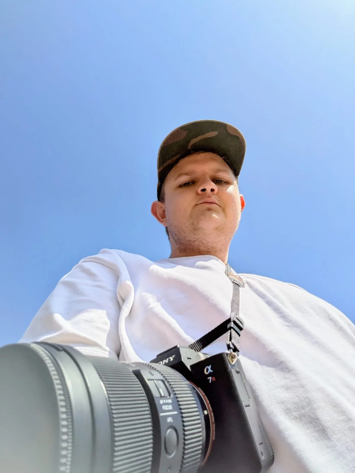 Jonny McGilloway Photographer with his camera